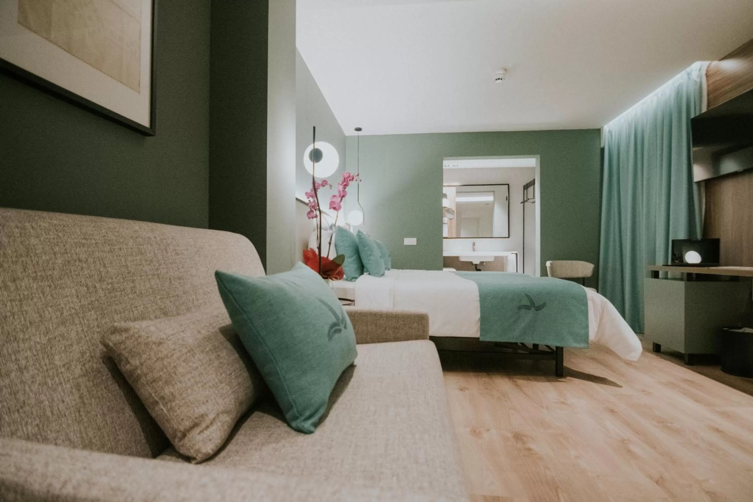 Bed in Catalina Plaza Hotel Sostenible