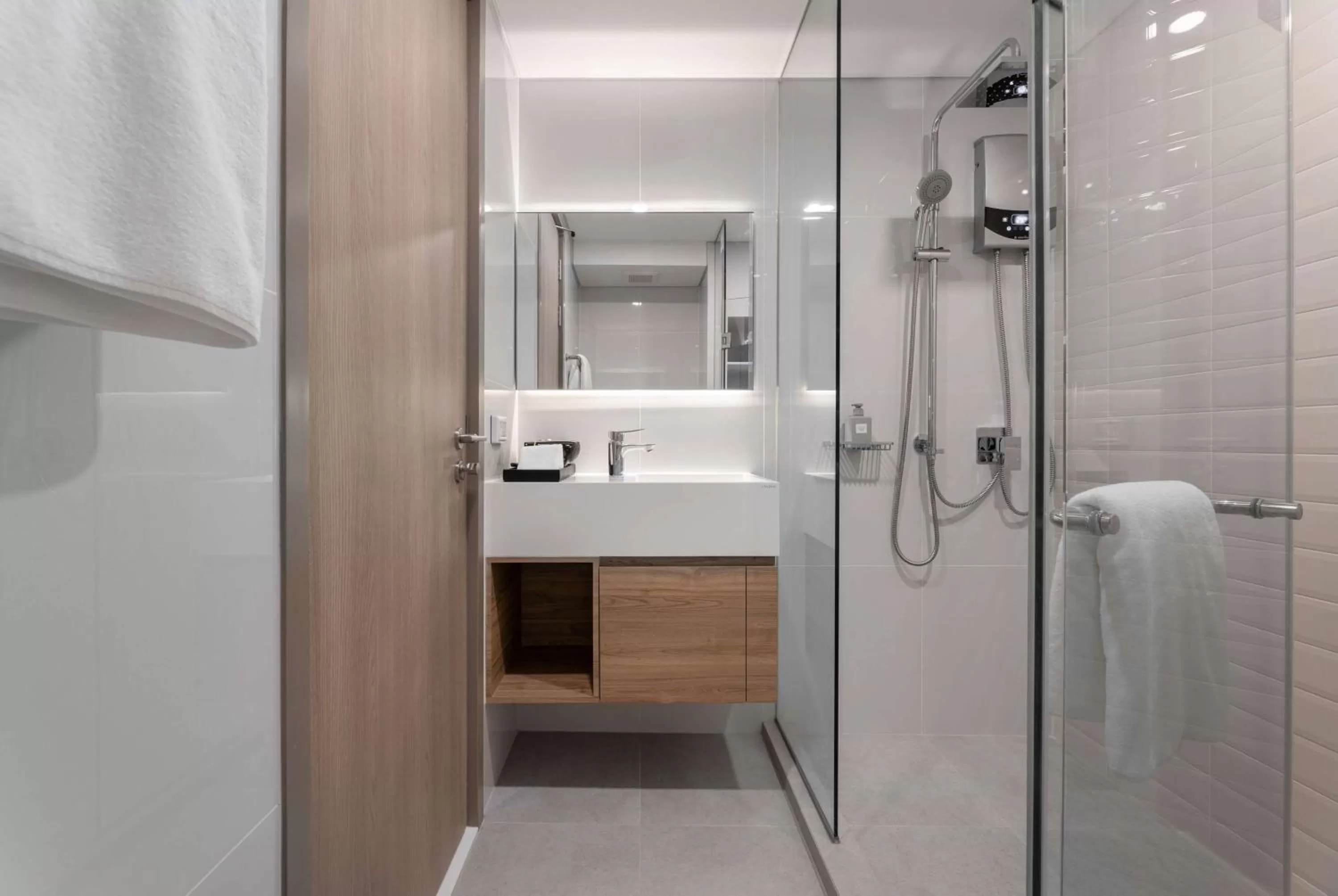Bathroom in Ramada By Wyndham Bangkok Sukhumvit 87