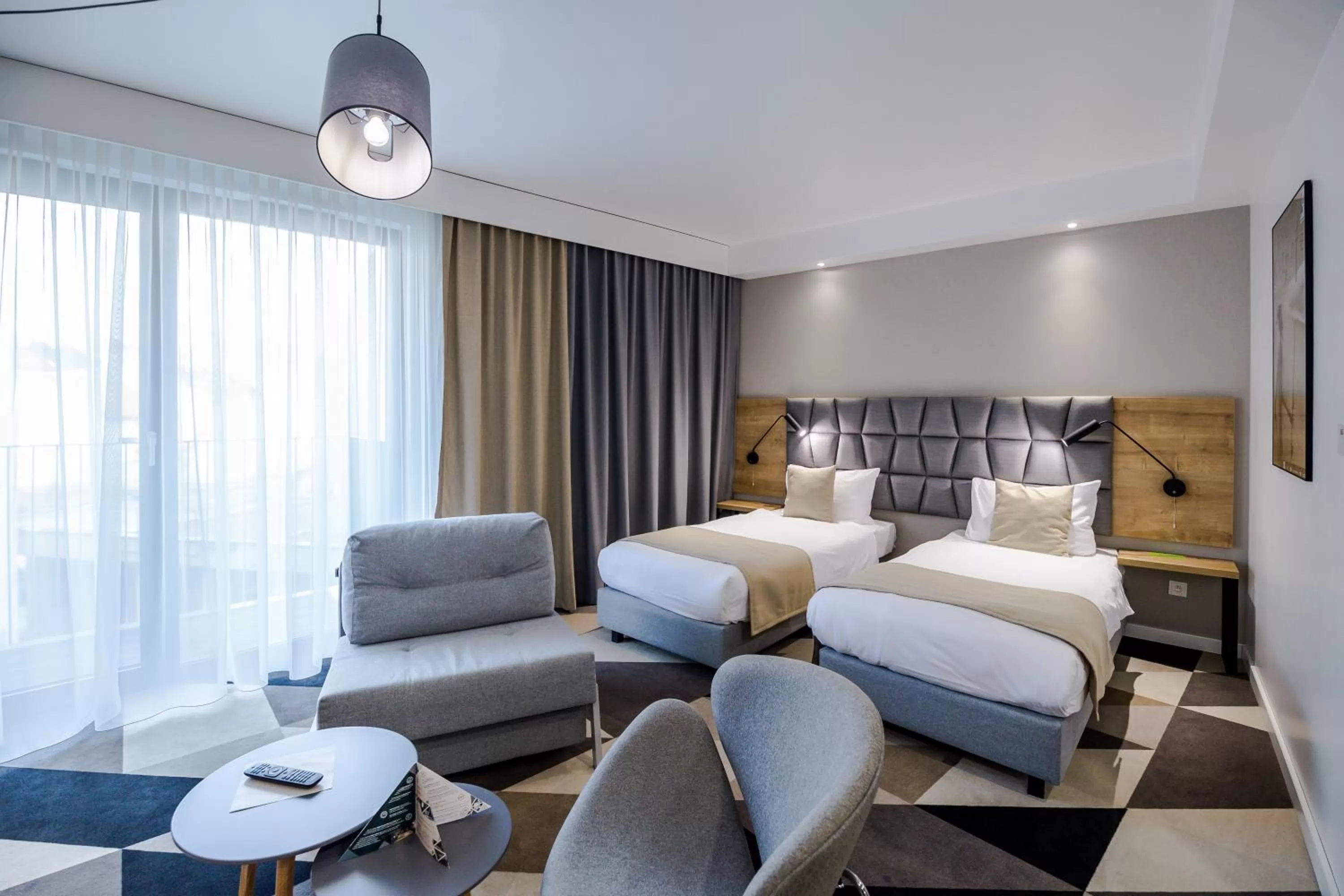 Seating area, Bed in Lwowska 1