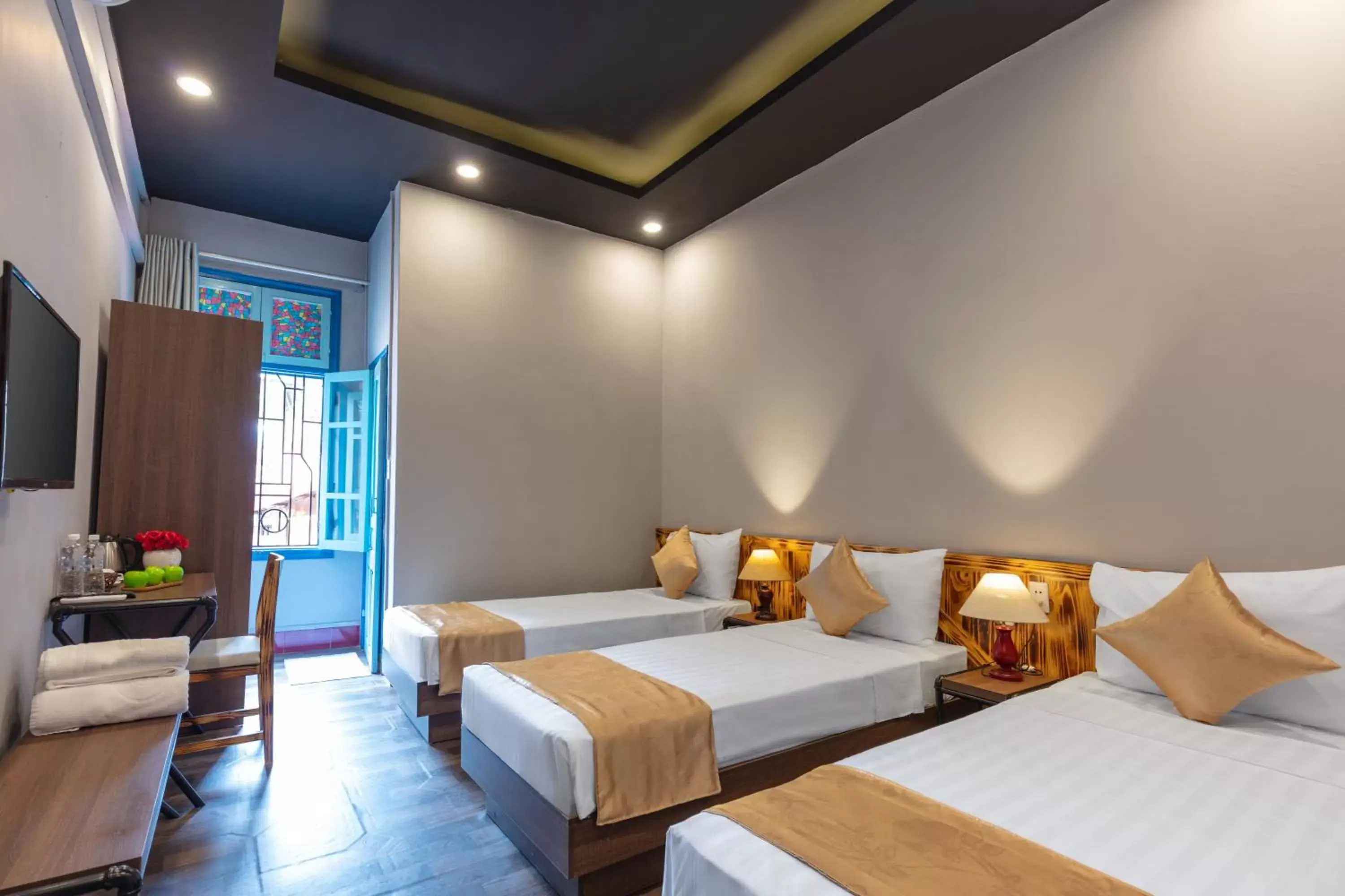 Deluxe Triple Room in CATHEDRAL HANOI BACKPACKERS Deluxe Triple Room in CATHEDRAL HANOI BACKPACKERS