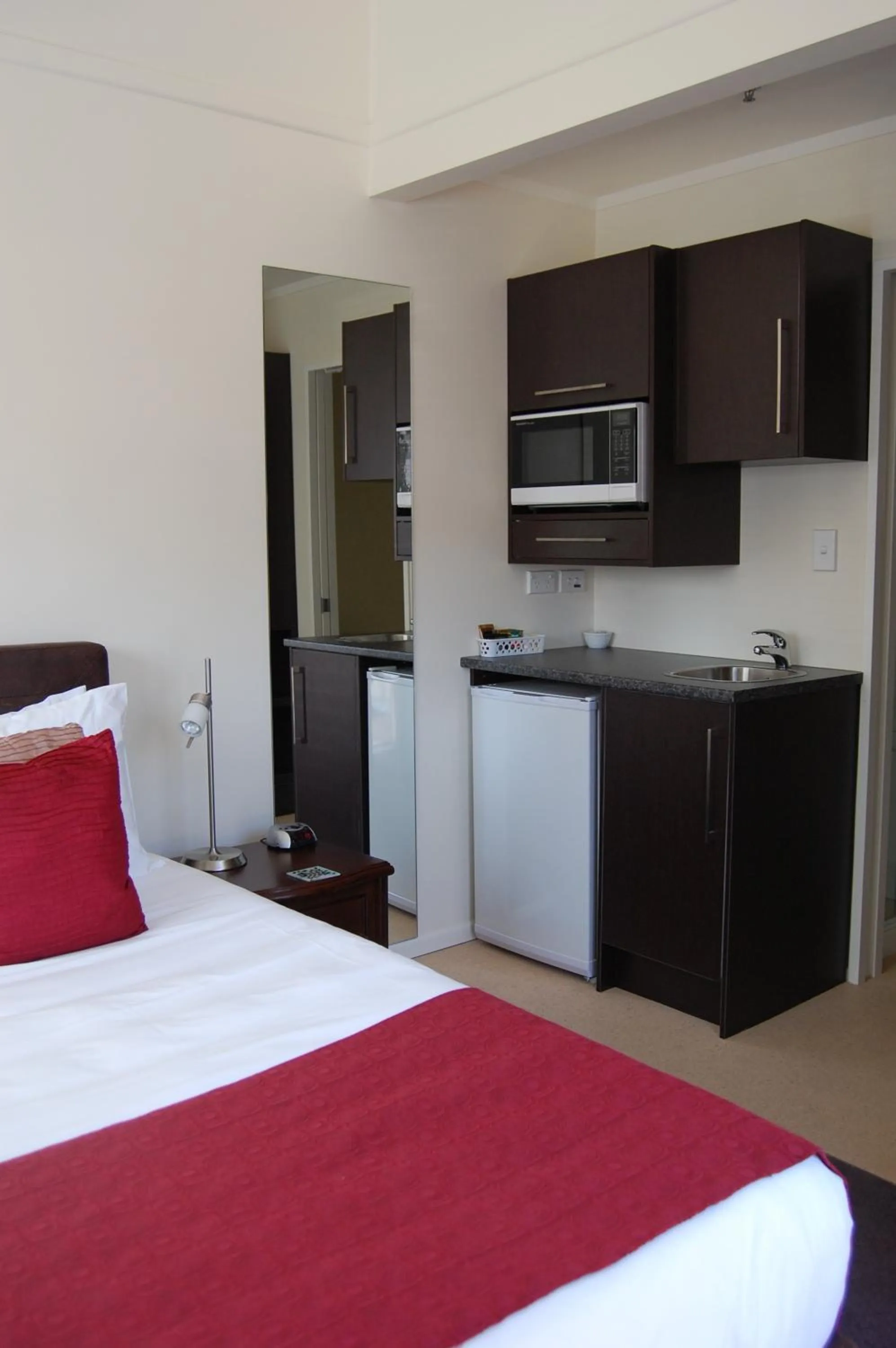 Bed in At Eden Park Motel