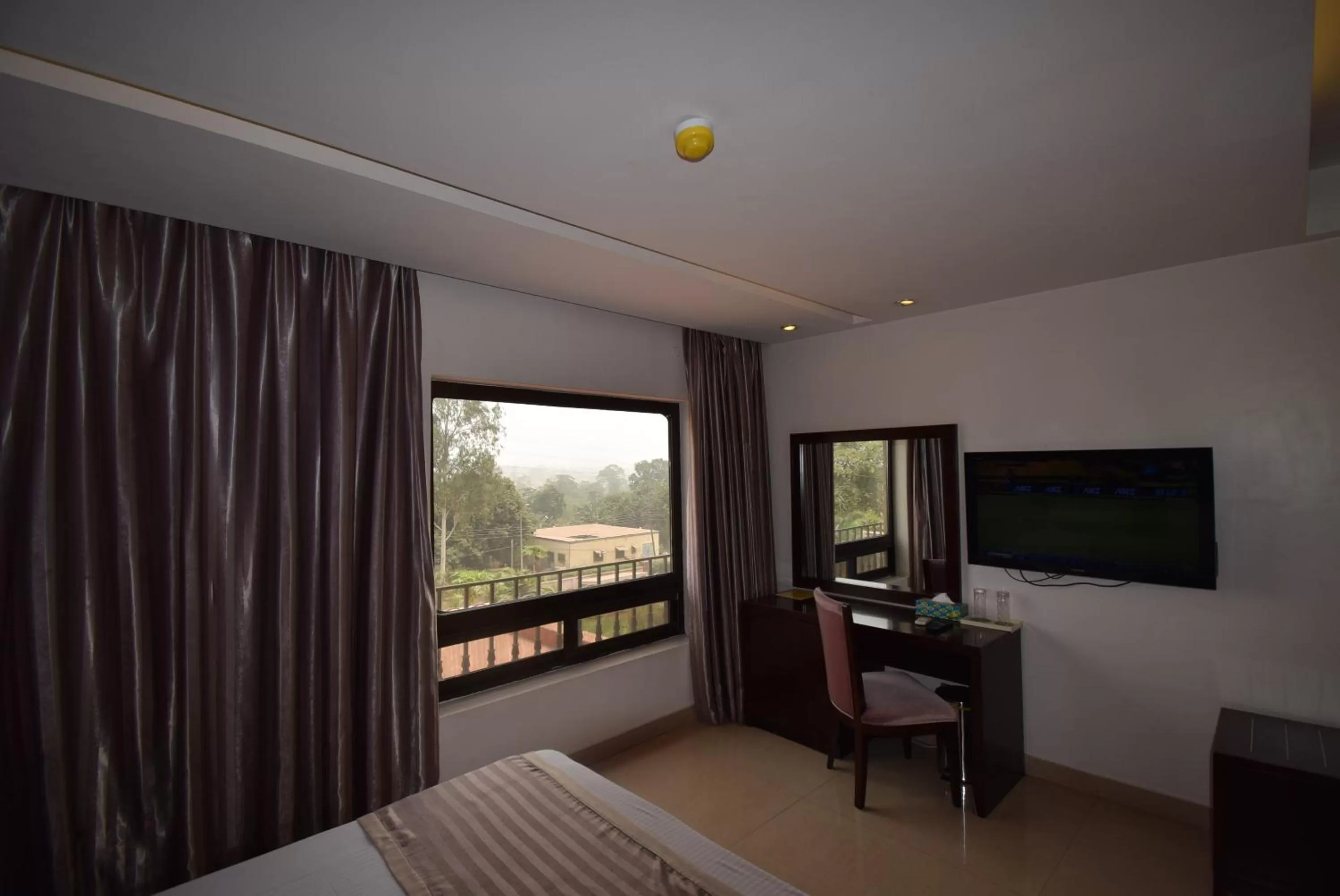 Street view, TV/Entertainment Center in Noble House Hotel