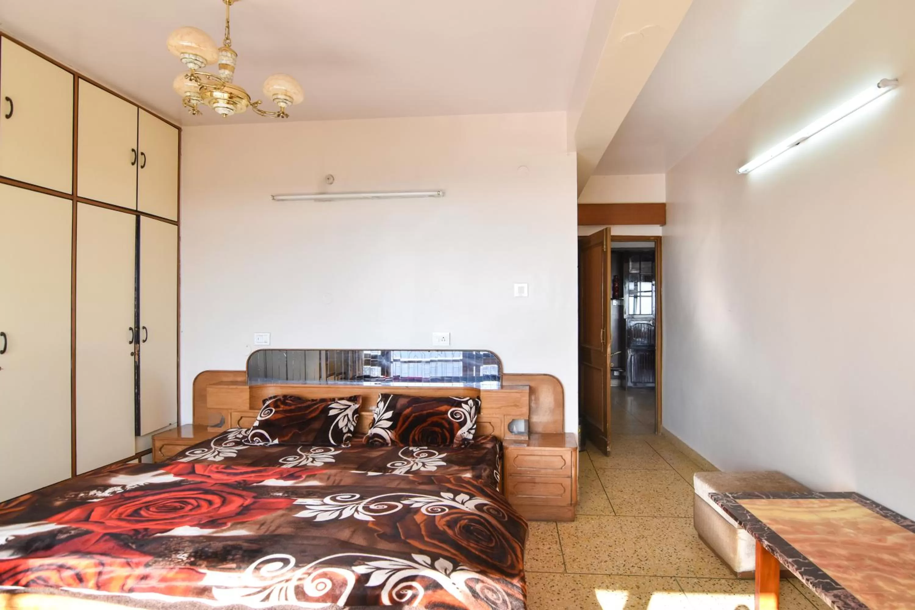 Bedroom, Bed in Dhanlaxmi Apartments