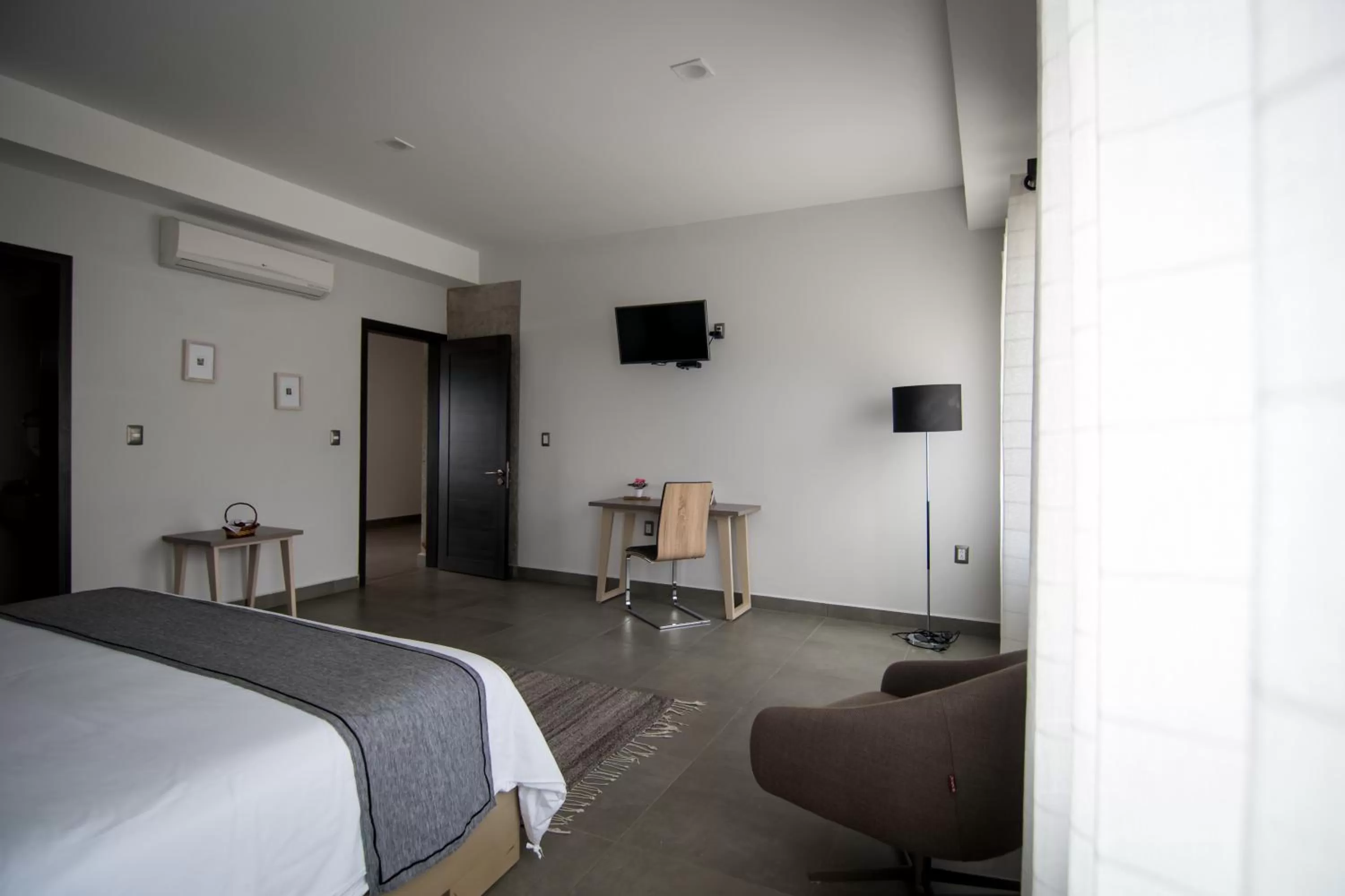 Photo of the whole room, Bed in Maria Ines Hotel Suite