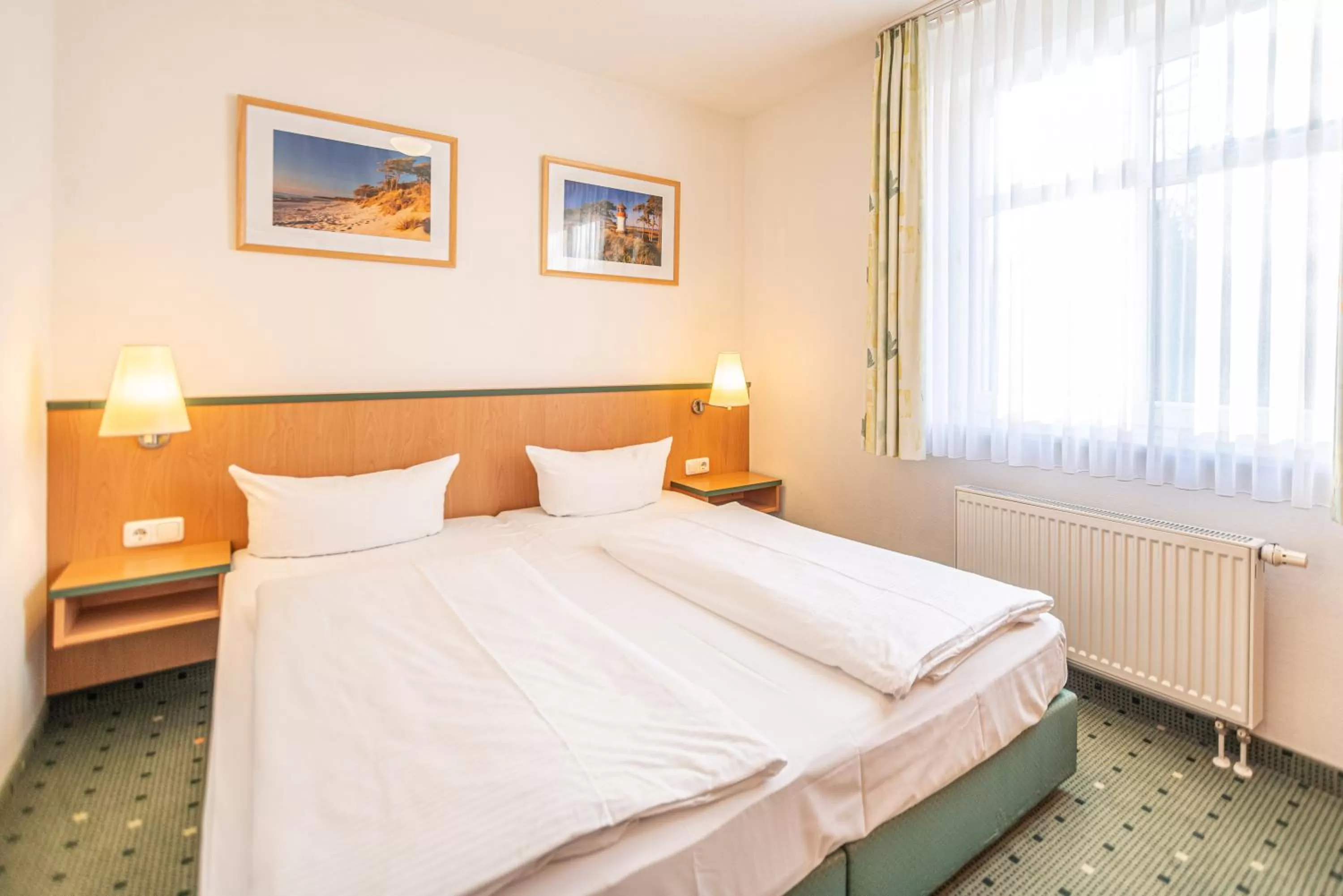 Photo of the whole room, Bed in Am Weststrand Apartmenthaus Waldeck