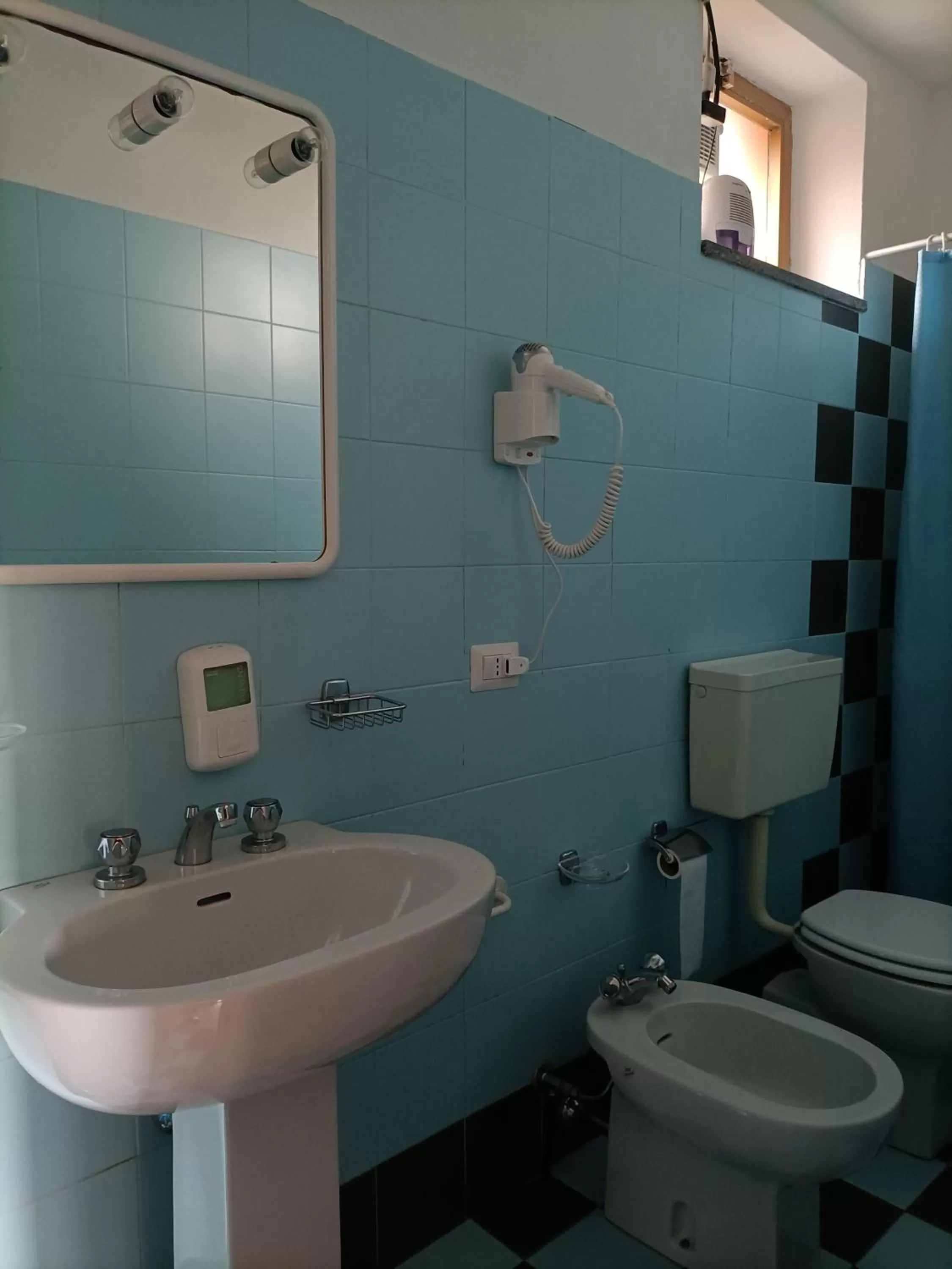 Bathroom in Albergo Roma