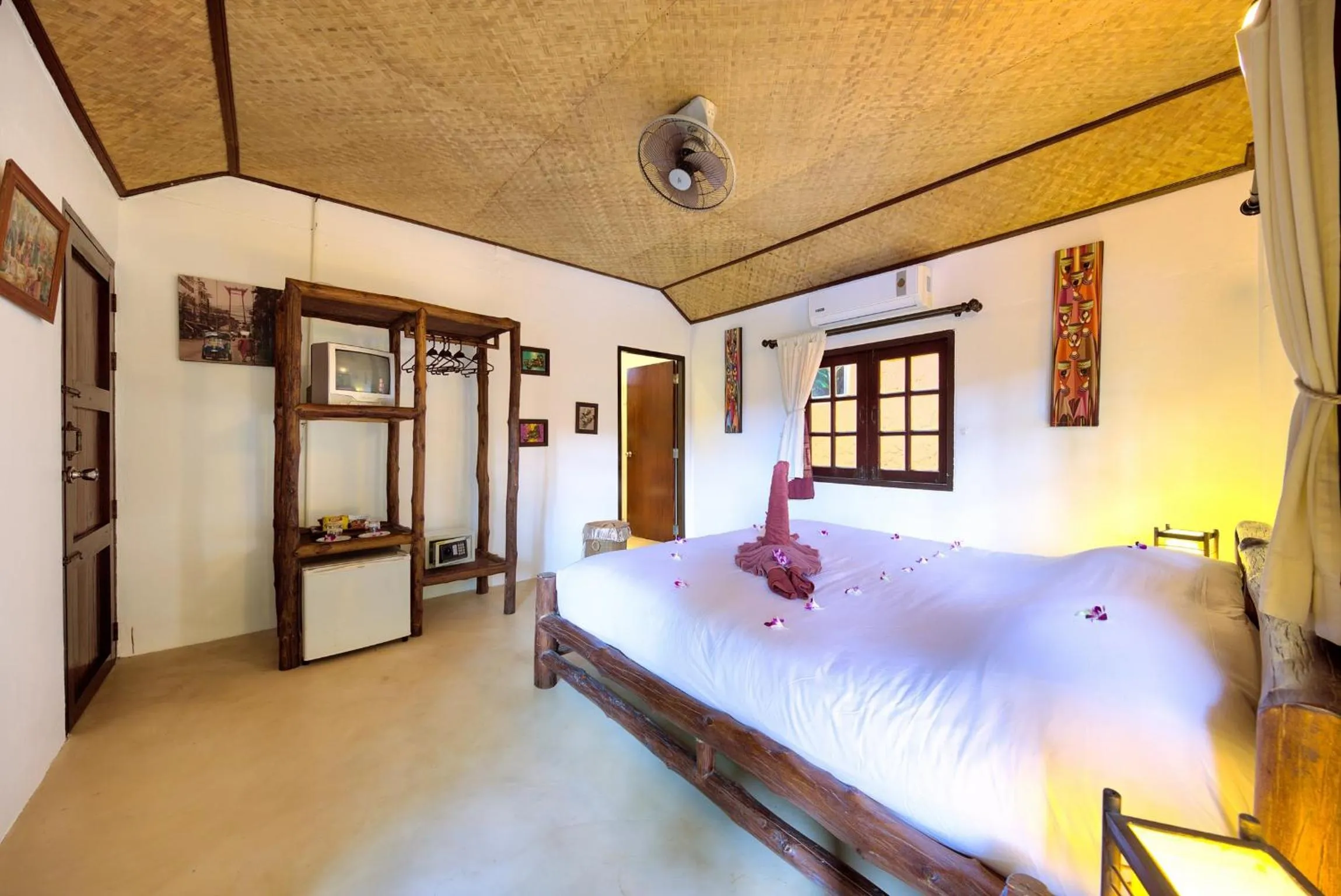 Photo of the whole room, Bed in Eden Bungalows Fisherman's village