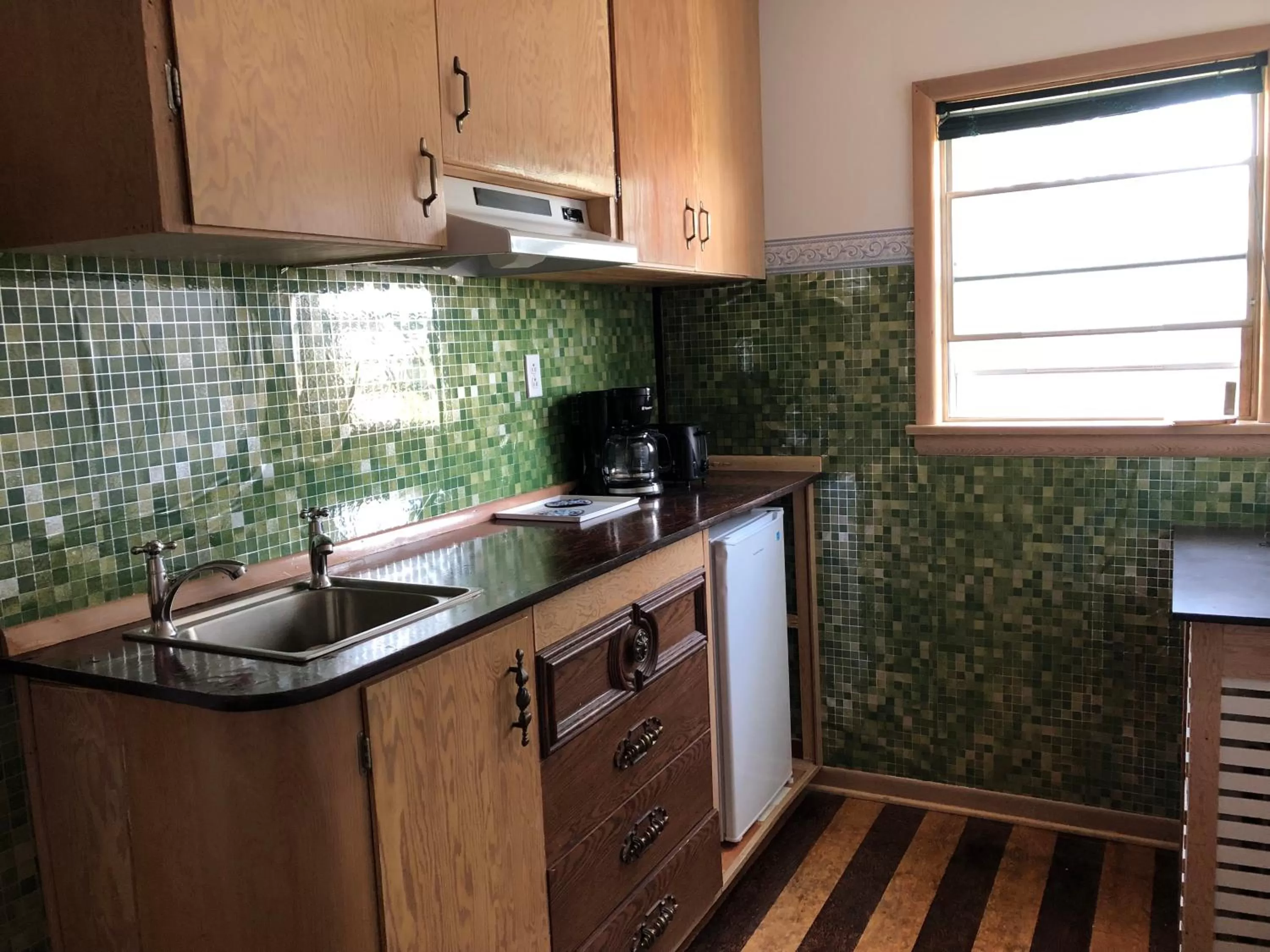 Kitchen or kitchenette in Heritage Place Hotel