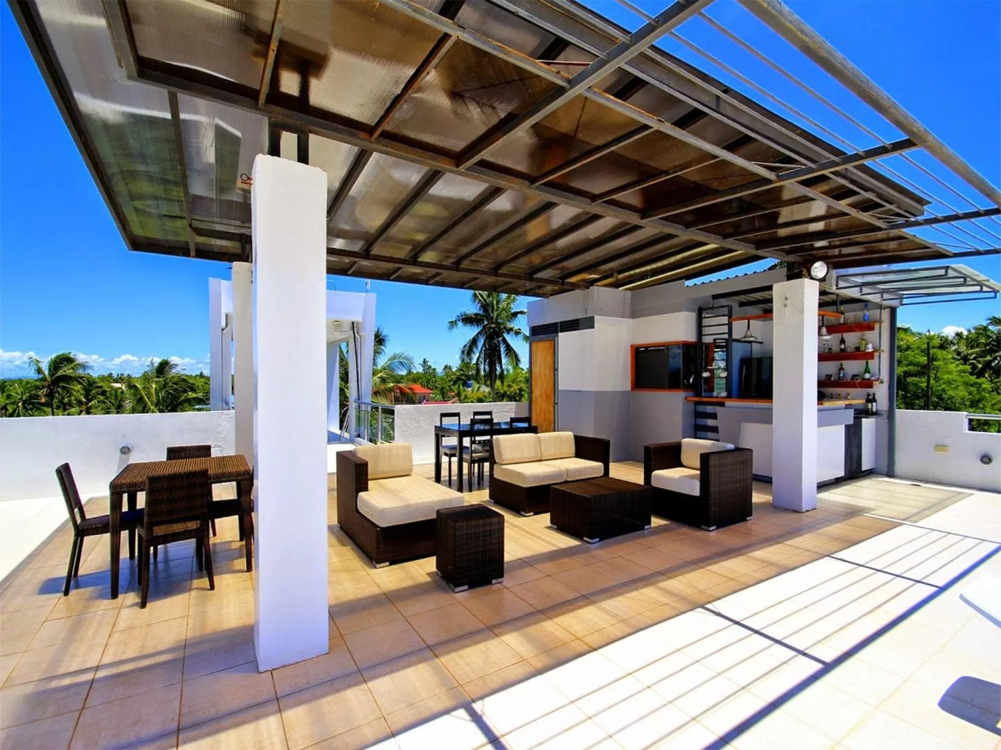 Communal lounge/ TV room in Bohol South Beach Hotel