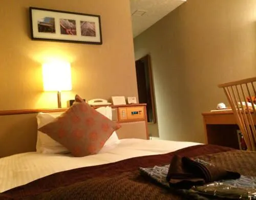 Bed in Hikone Castle Resort & Spa