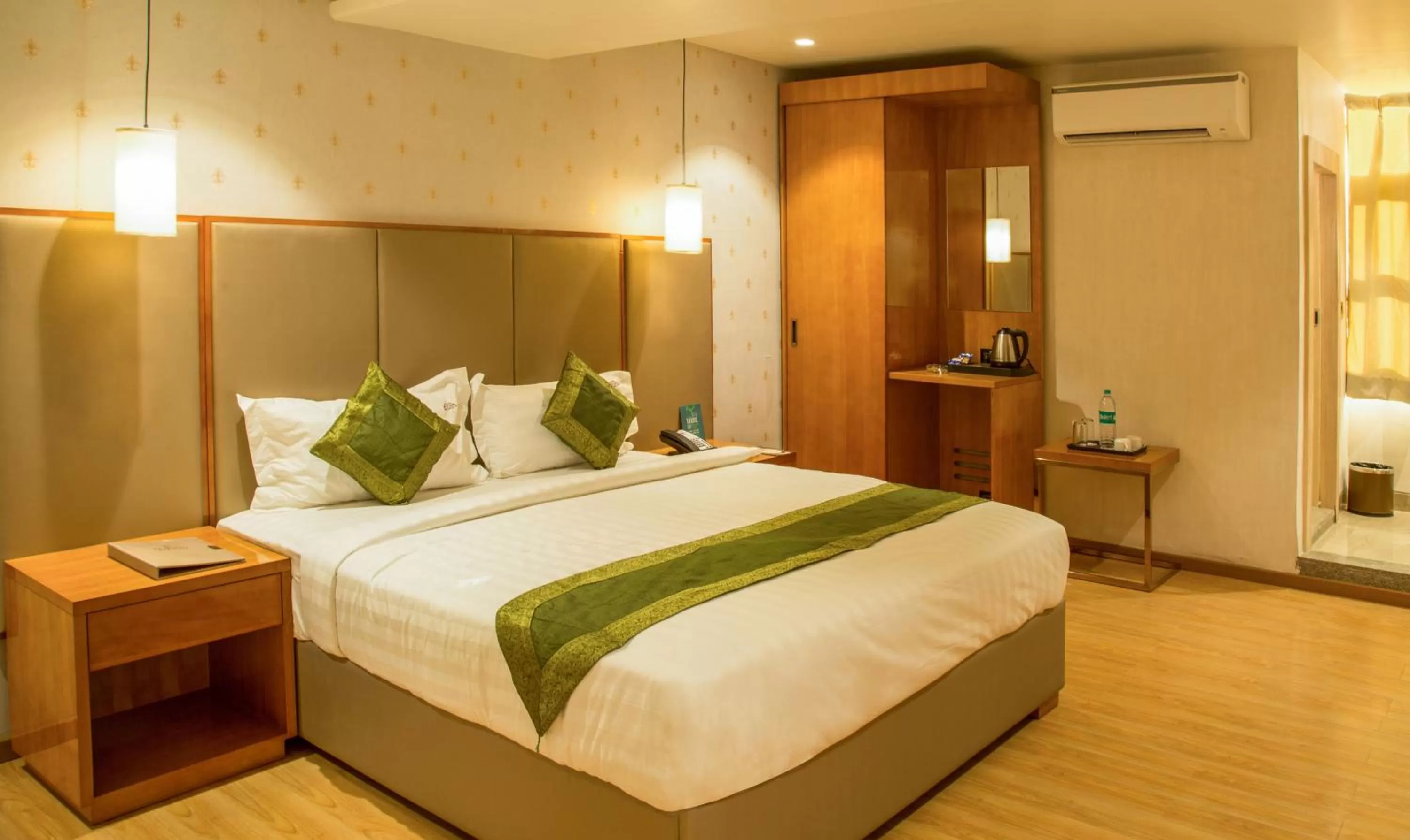 Bed in Hotel Reva Regency