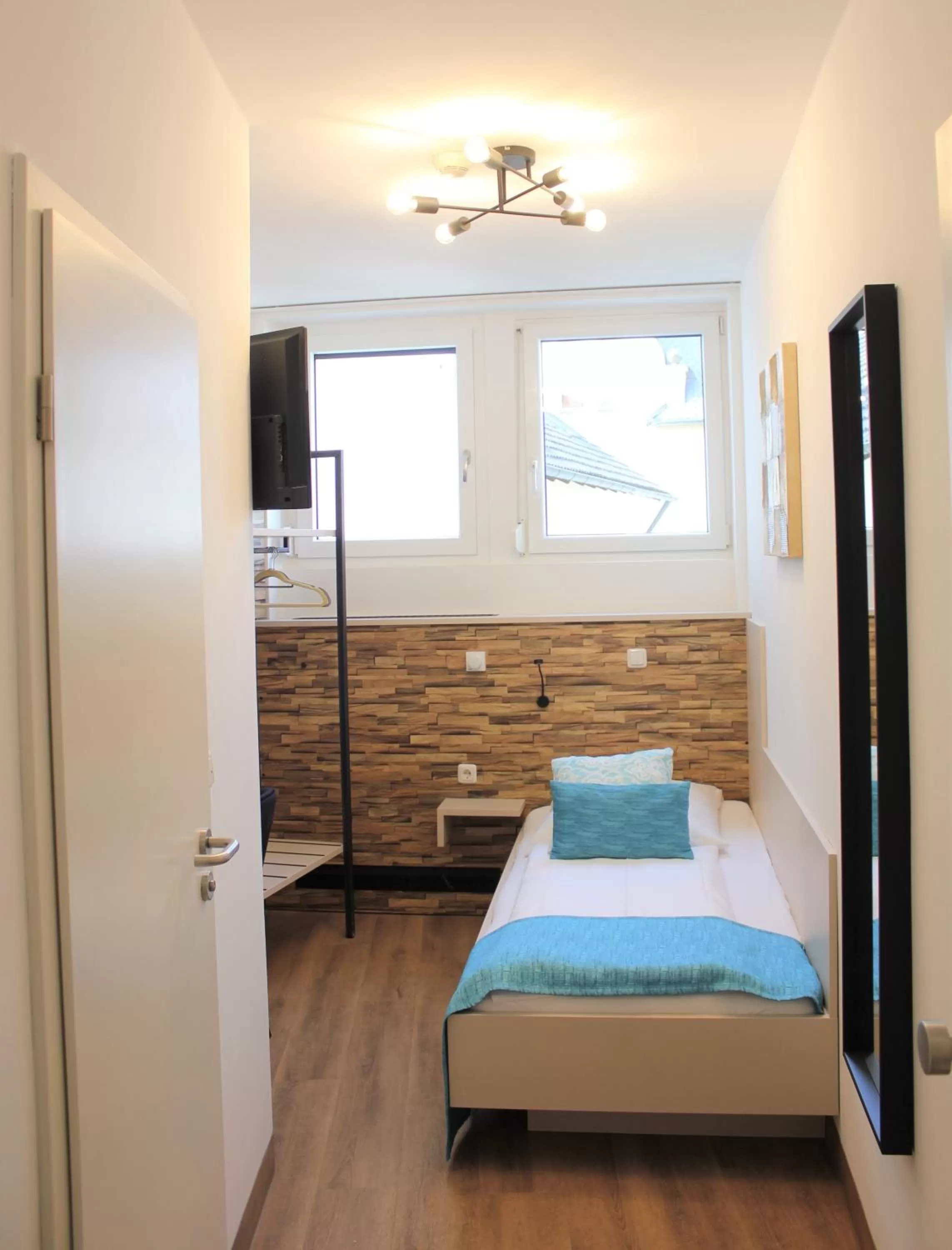 Photo of the whole room, Bed in Am Blumenhaus