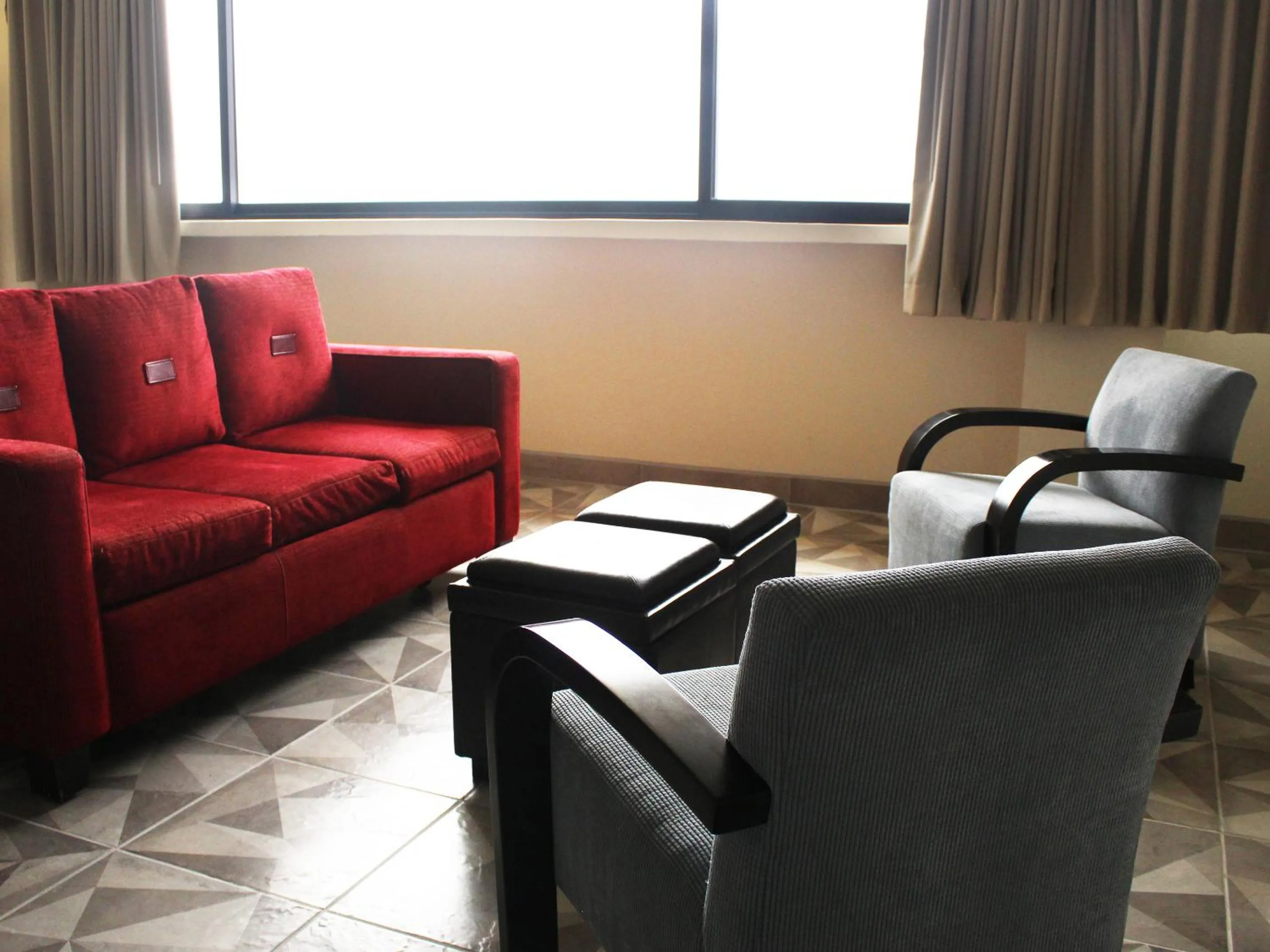 Seating area in Hotel Corona Plaza