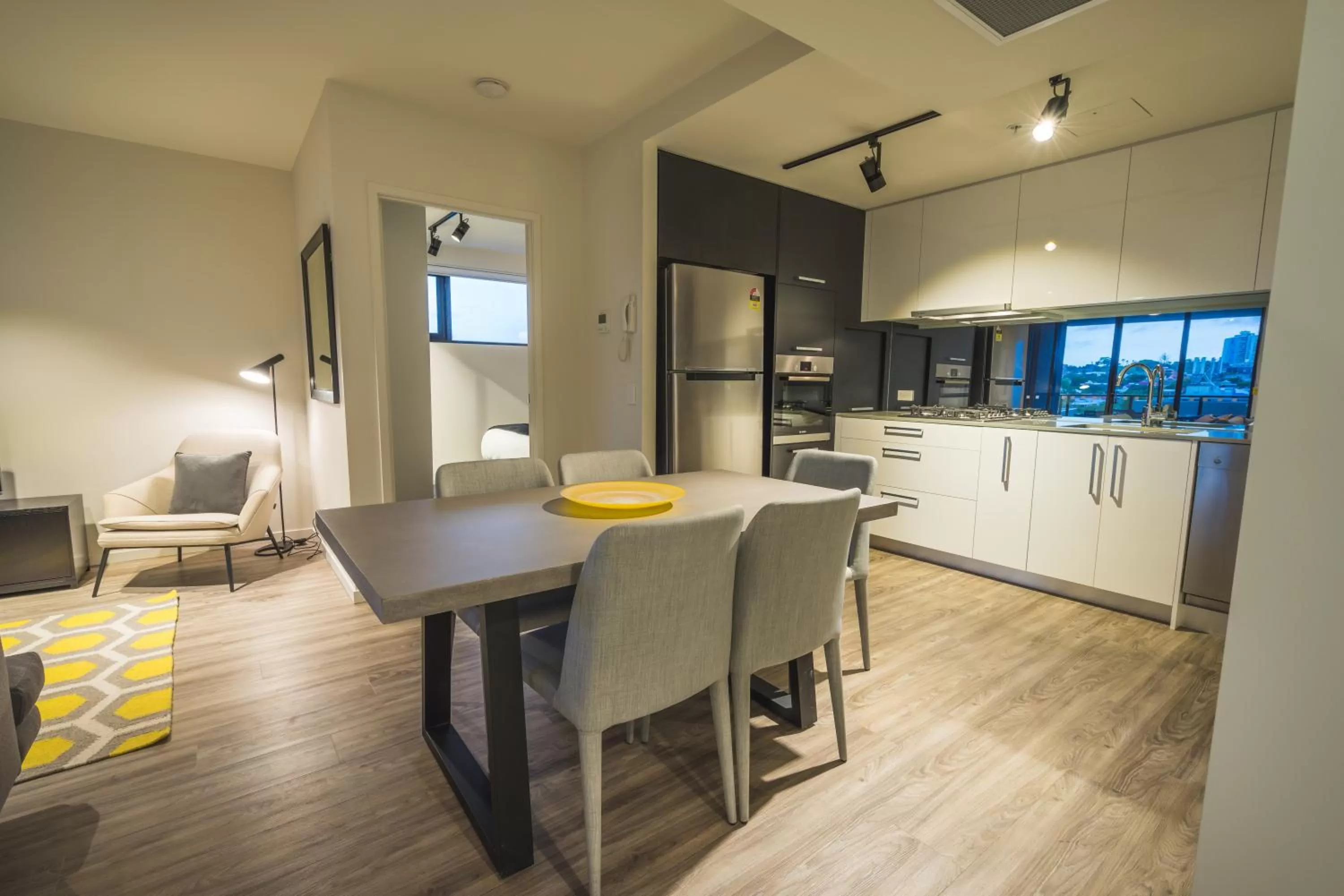 Dining area in Arena Apartments by CLLIX