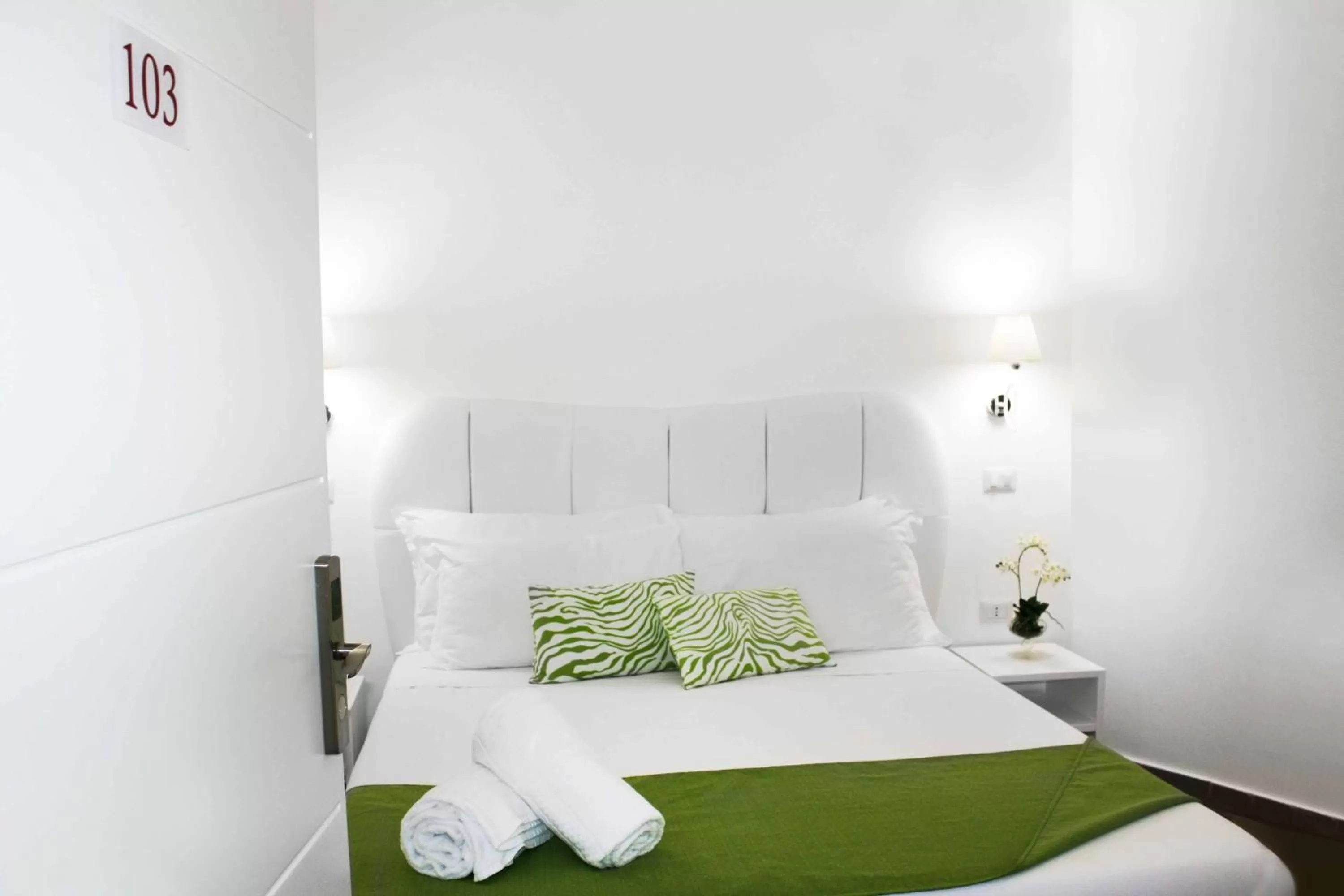 Bed in Roma Resort Colosseum