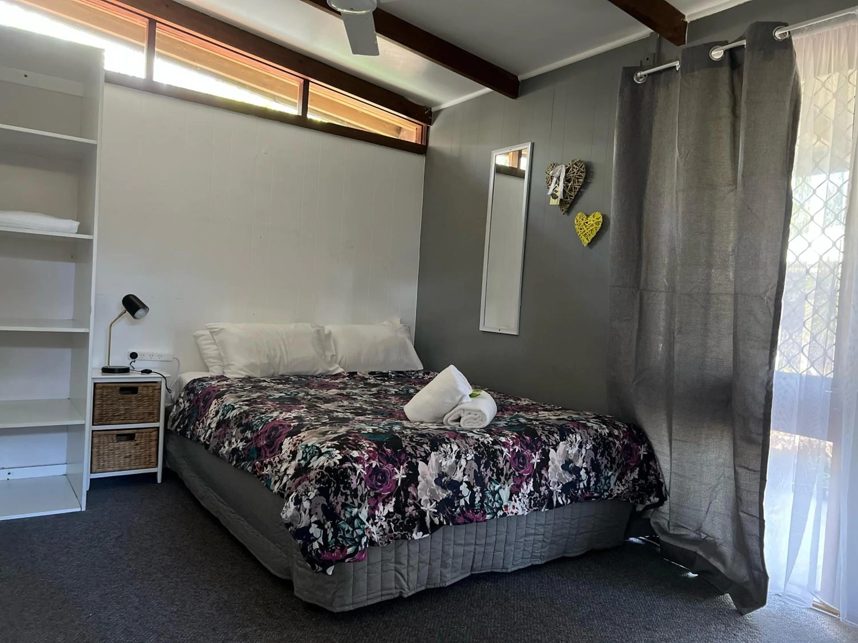 Bed in Colonial Village Resort