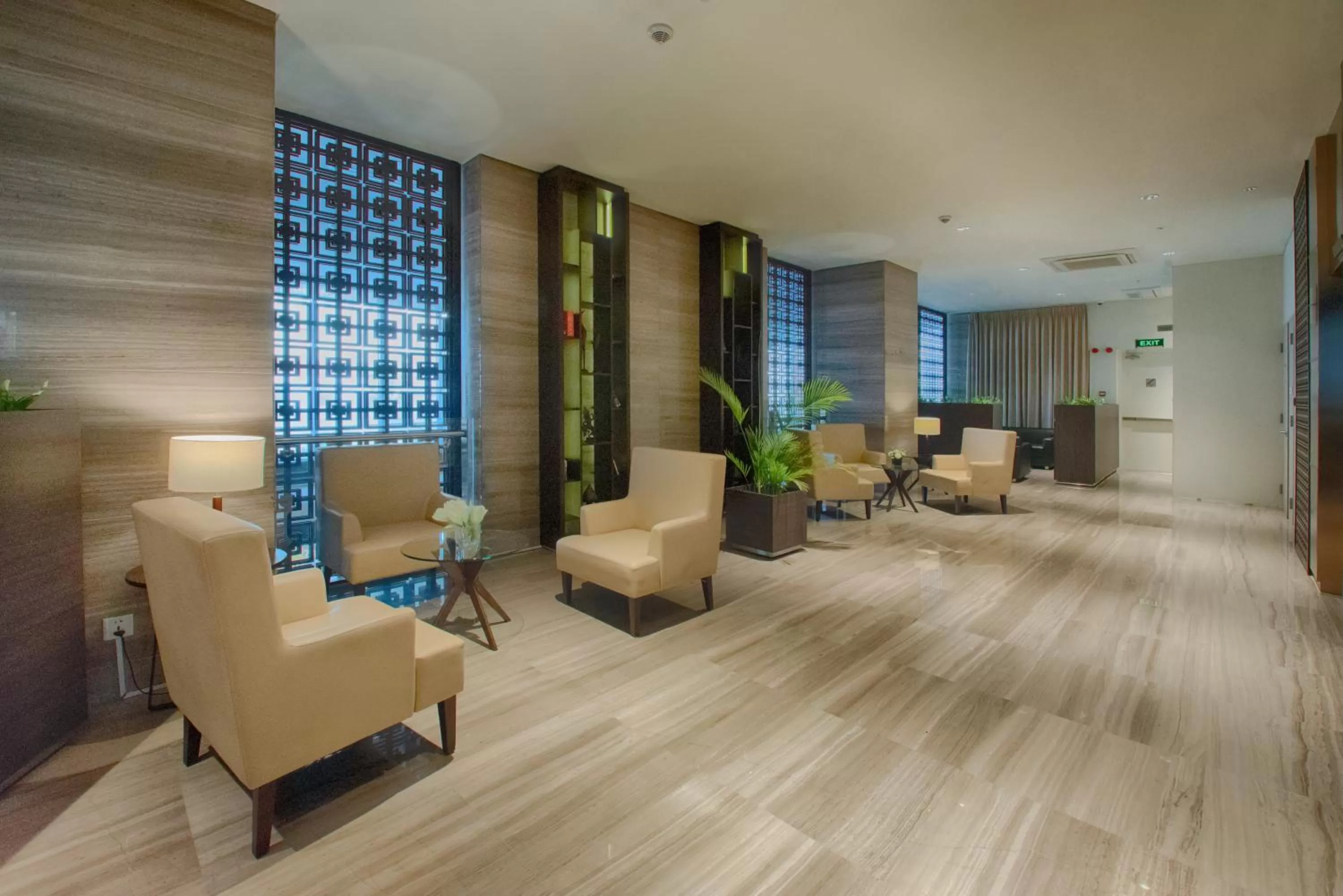 Communal lounge/ TV room in GRANFERTE Phnom Penh Hotel