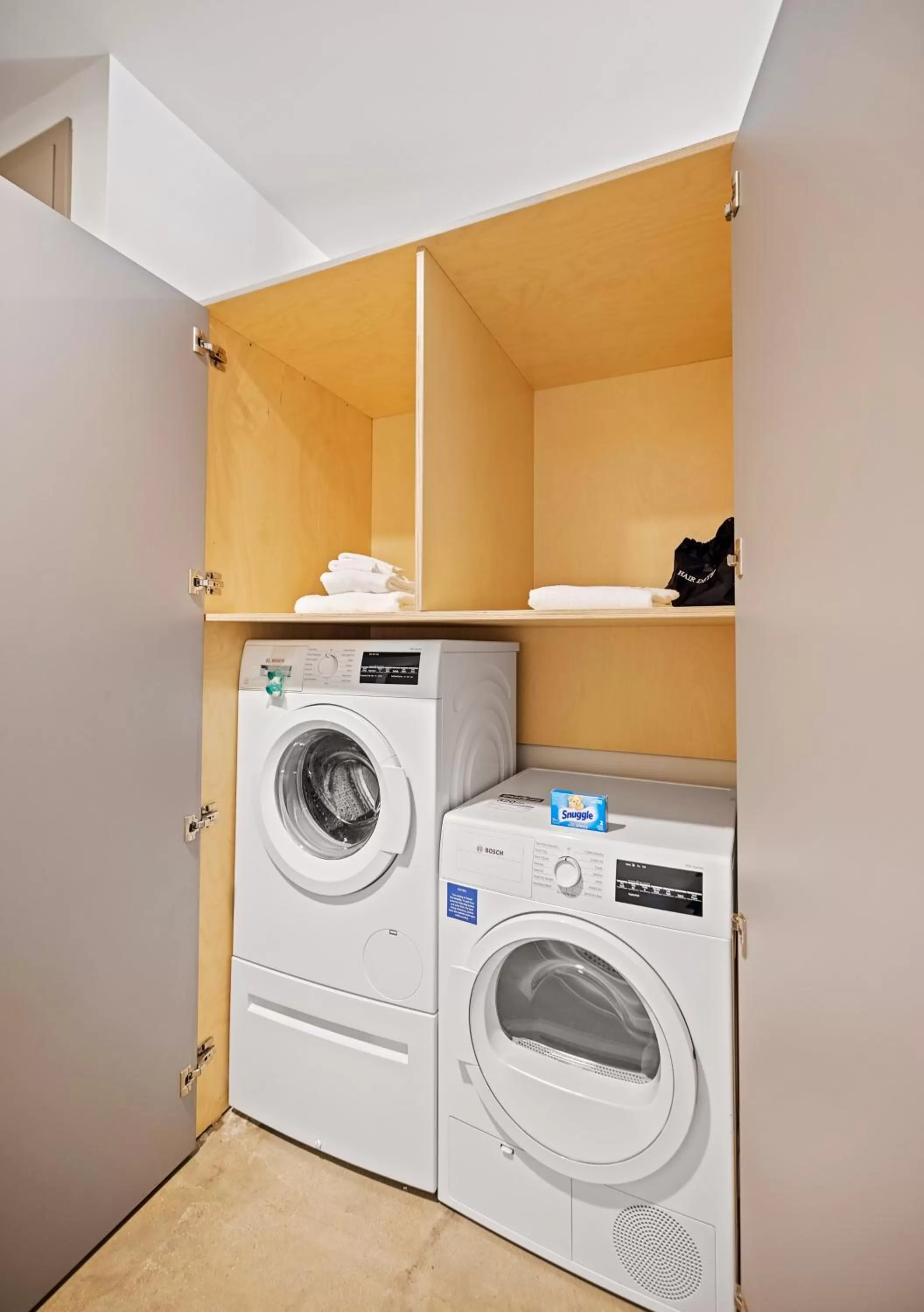 washing machine in Harthall Hotel