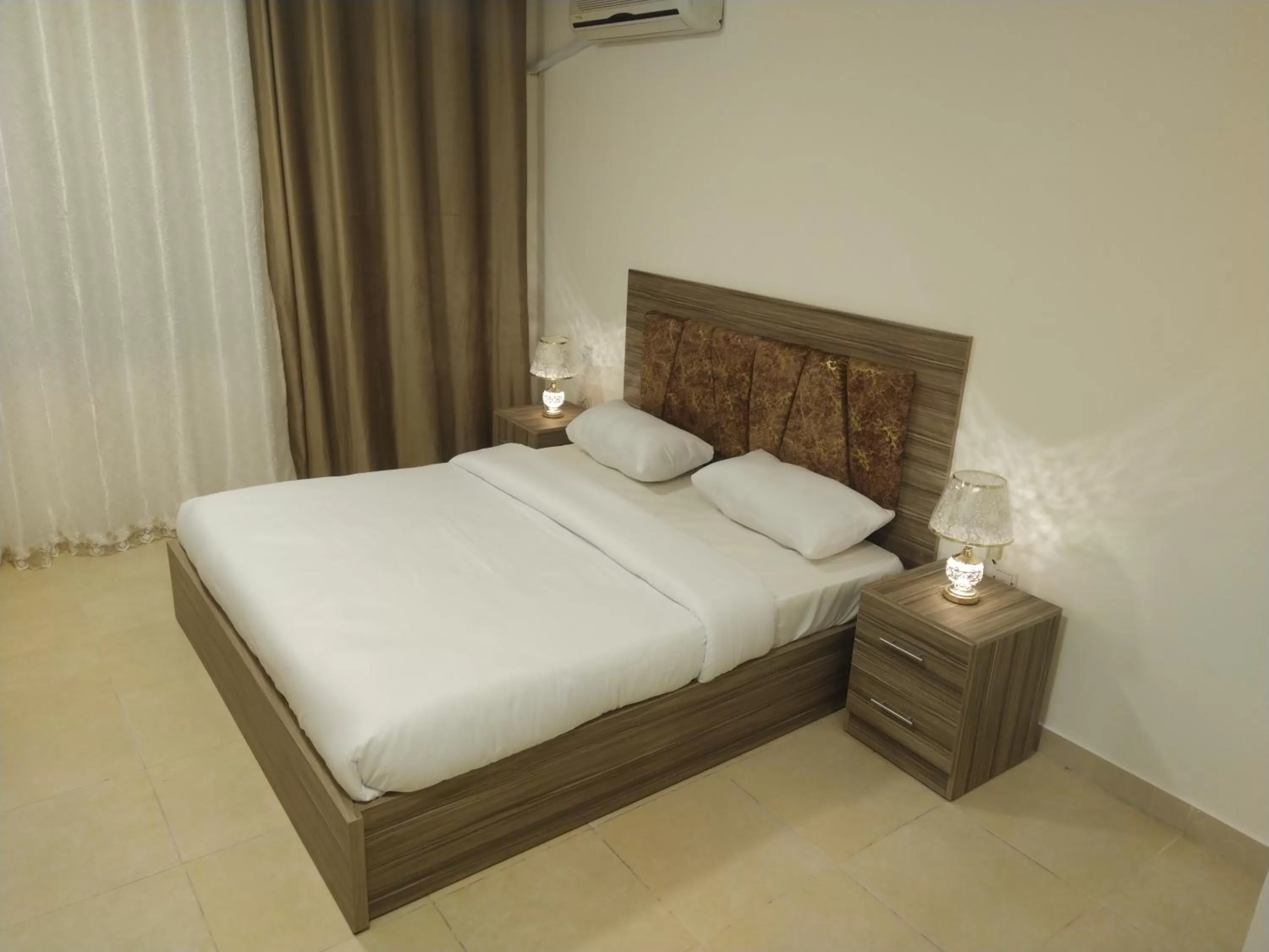 Photo of the whole room, Bed in Rayan Hotel Suites