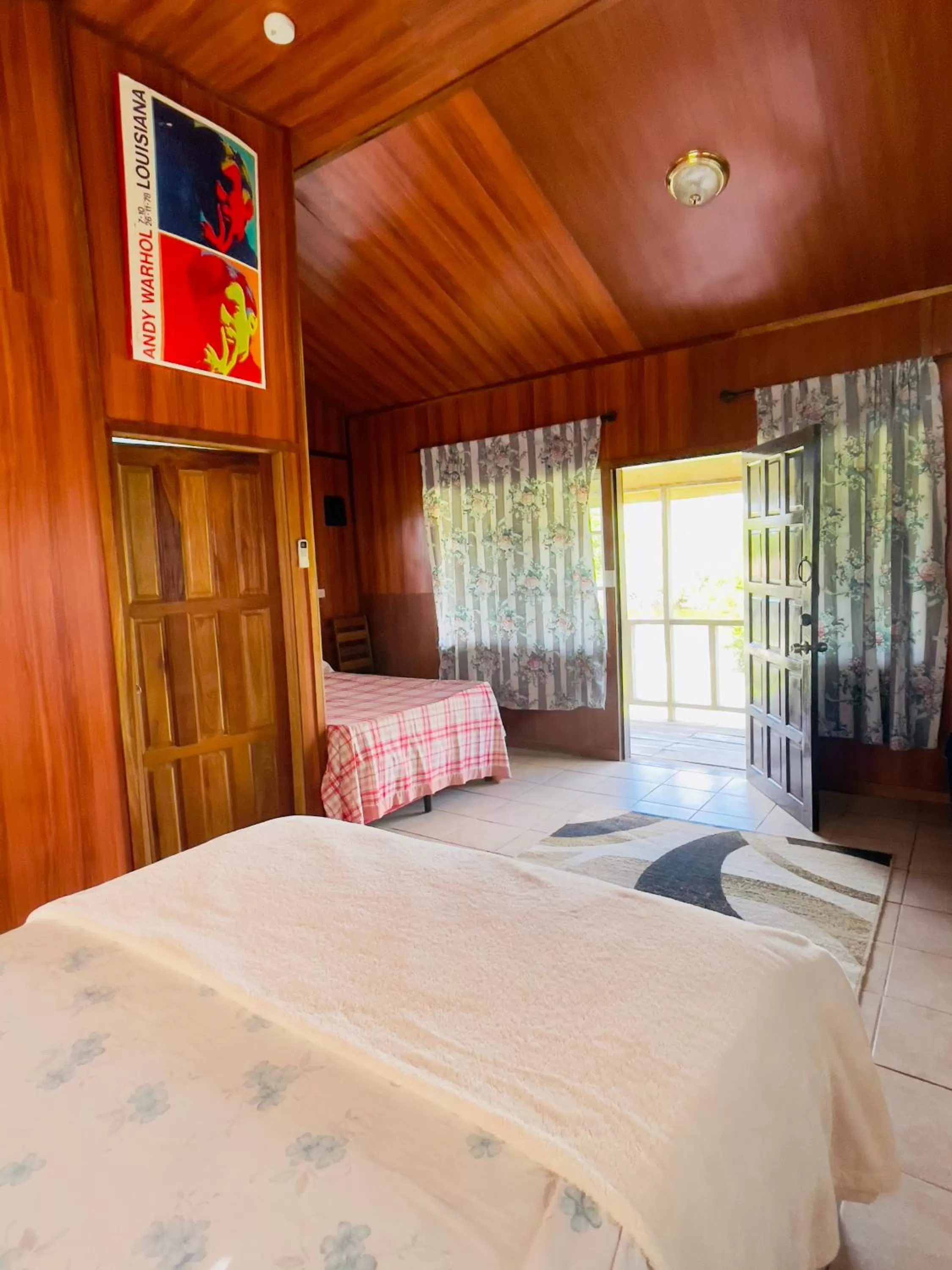 Bed in Lamanai Riverside Retreat