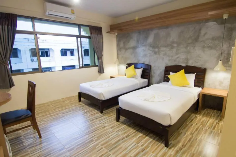 Bed in K.L. Boutique Hotel