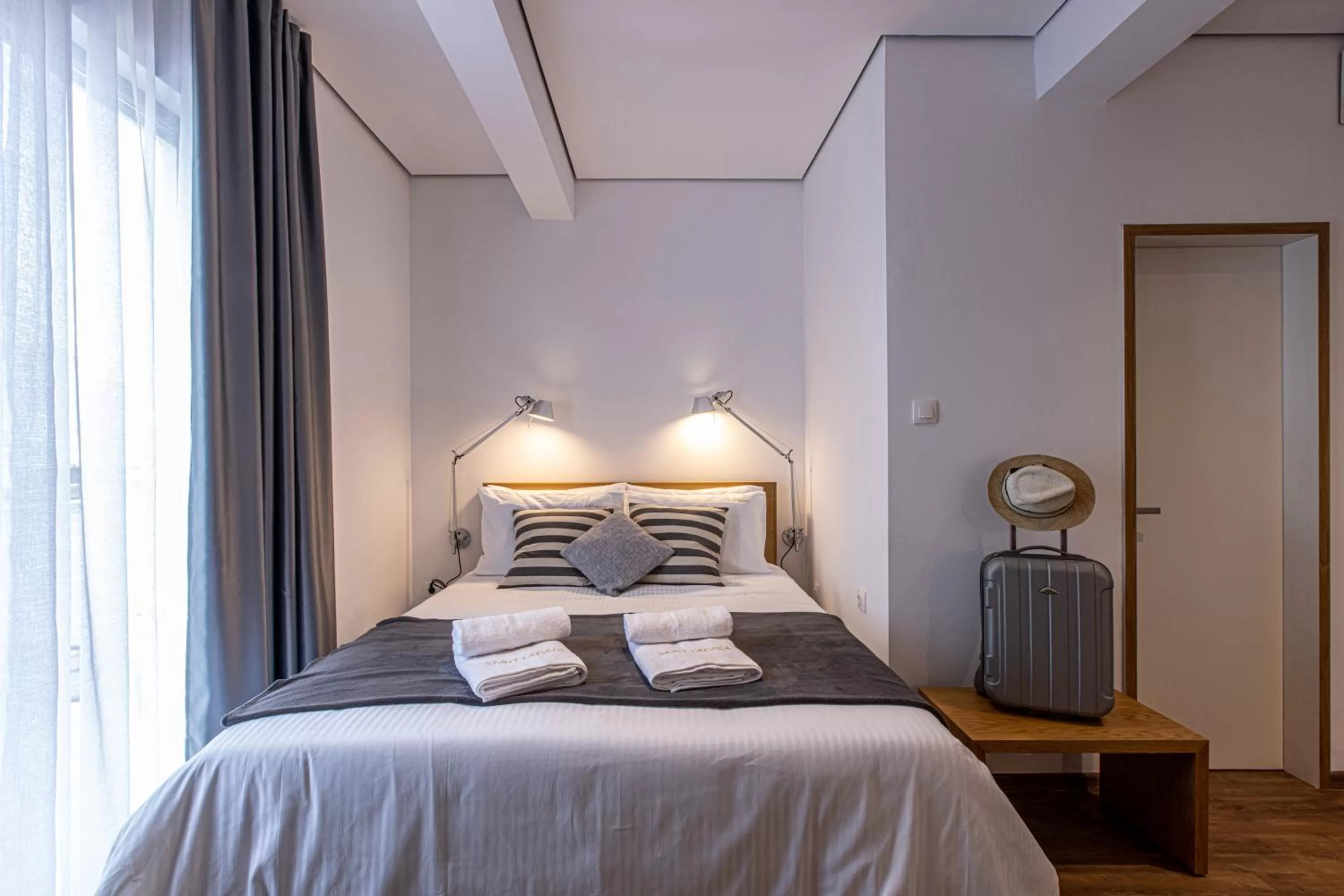 Bed in Saint George Boutique Rooms