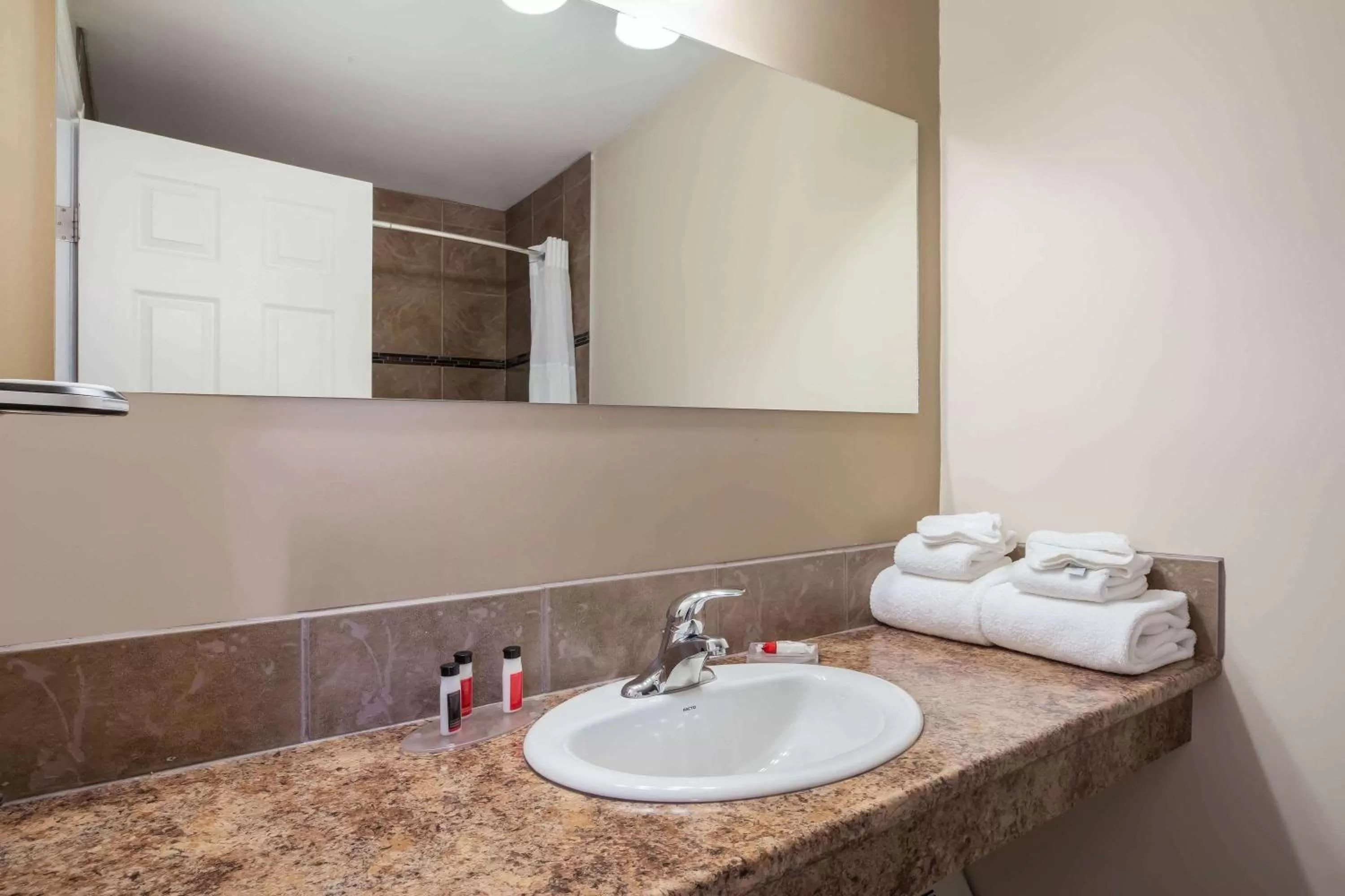 Bathroom in Super 8 by Wyndham Smoky Lake