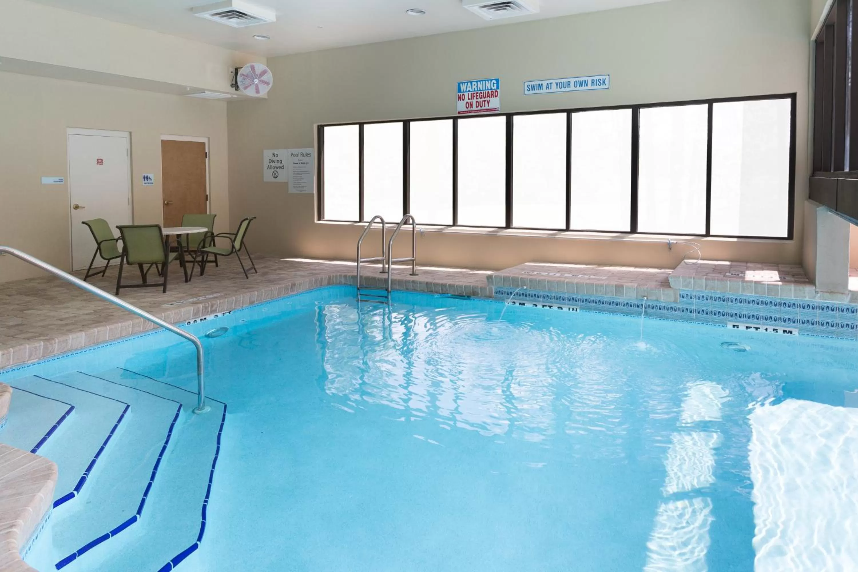 Swimming pool in Holiday Inn Express Hotel & Suites Jacksonville Airport by IHG