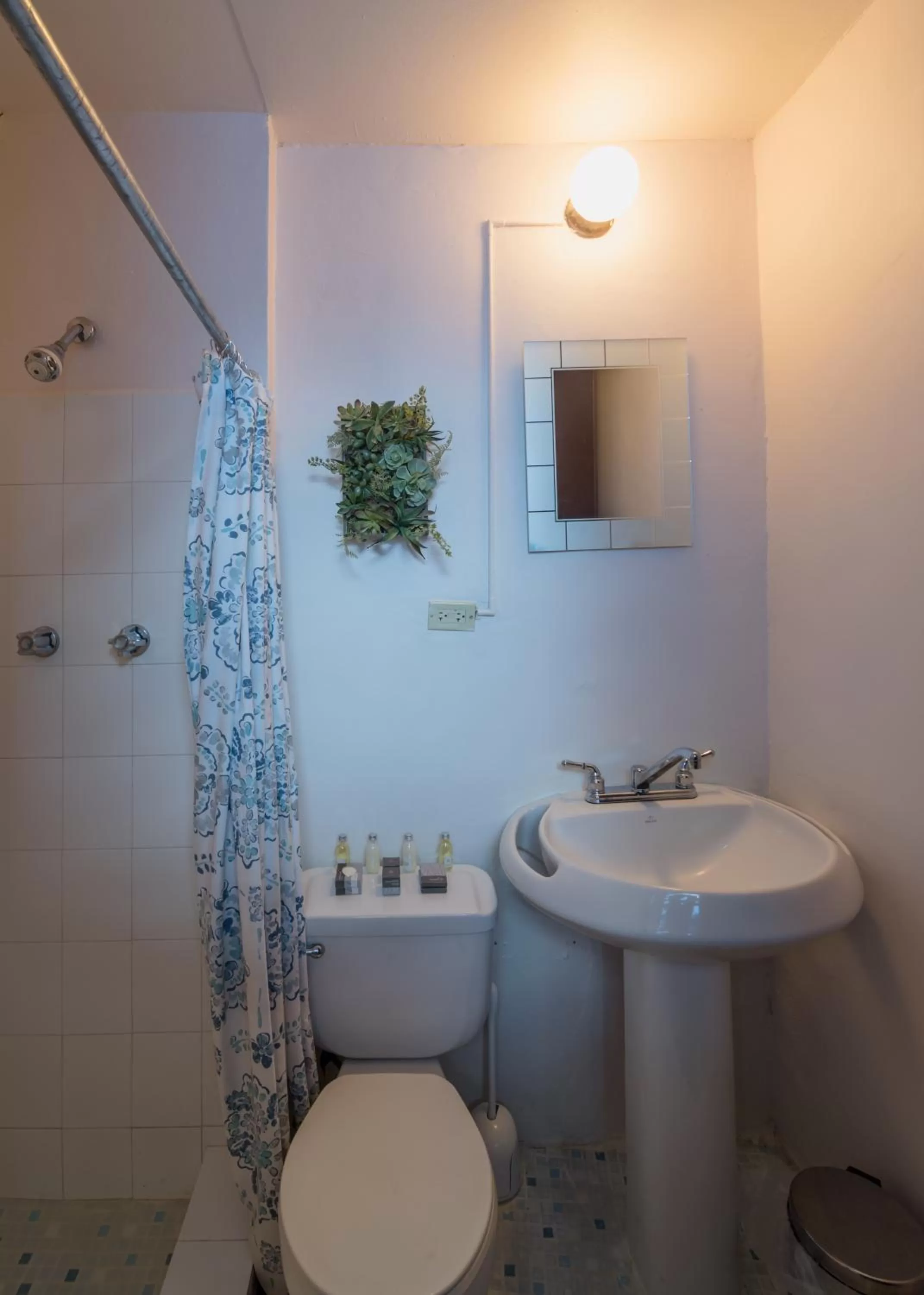 Bathroom in La Capitana Old San Juan Building