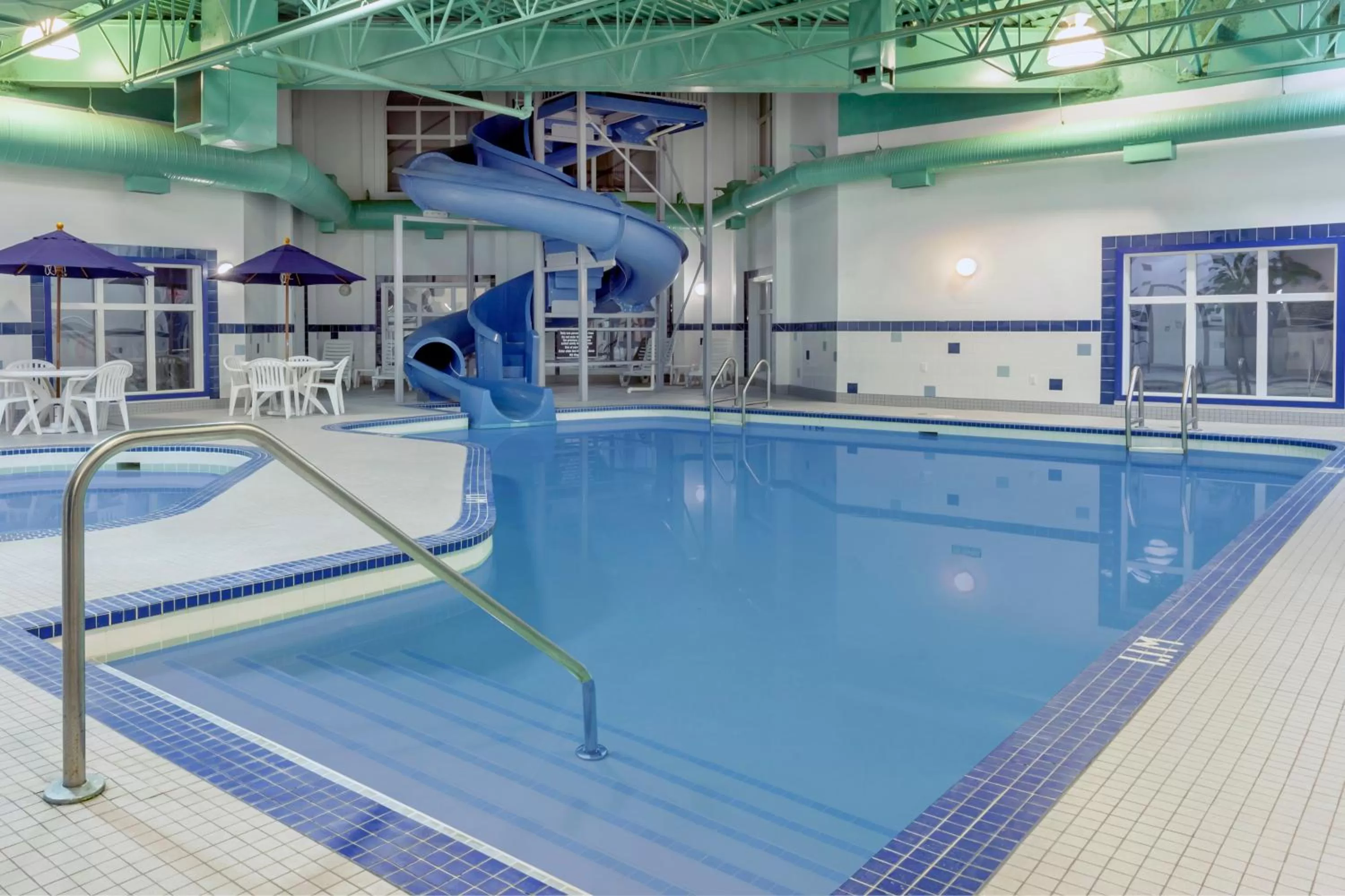 Swimming pool in Ramada by Wyndham Weyburn