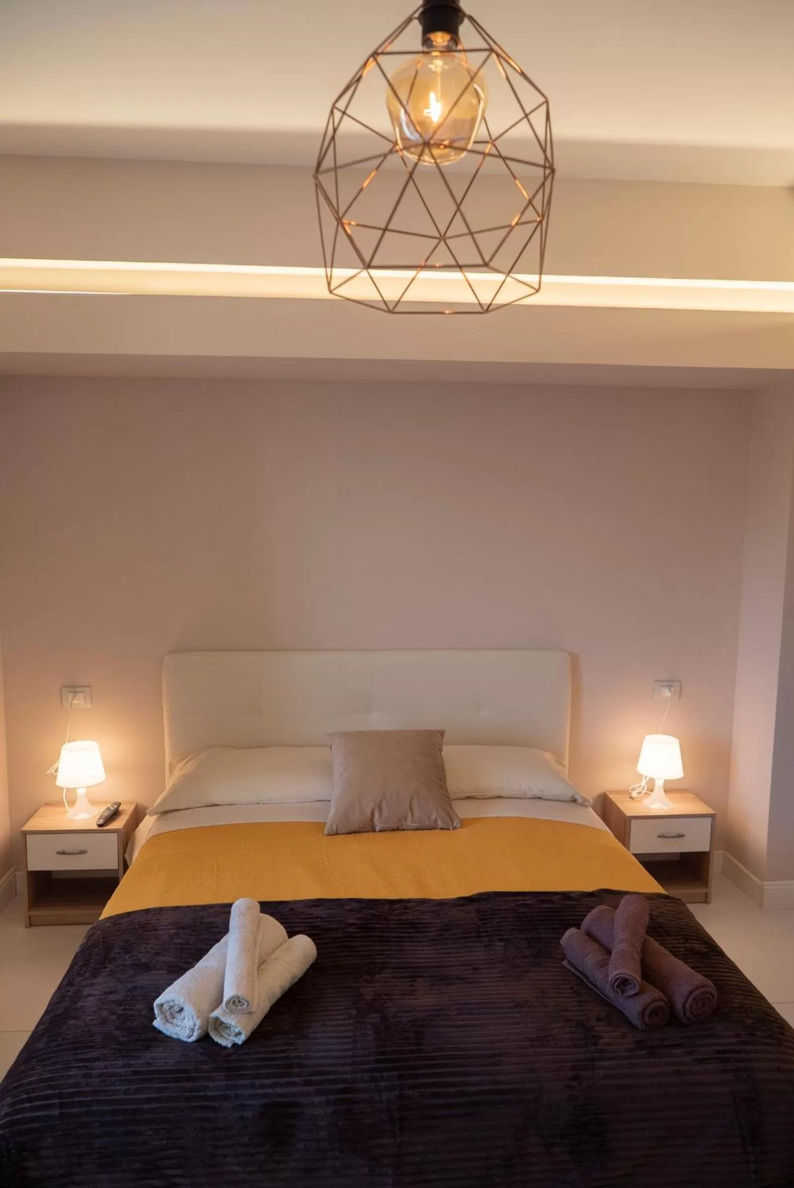 Bed in Belvedere Sea Suite