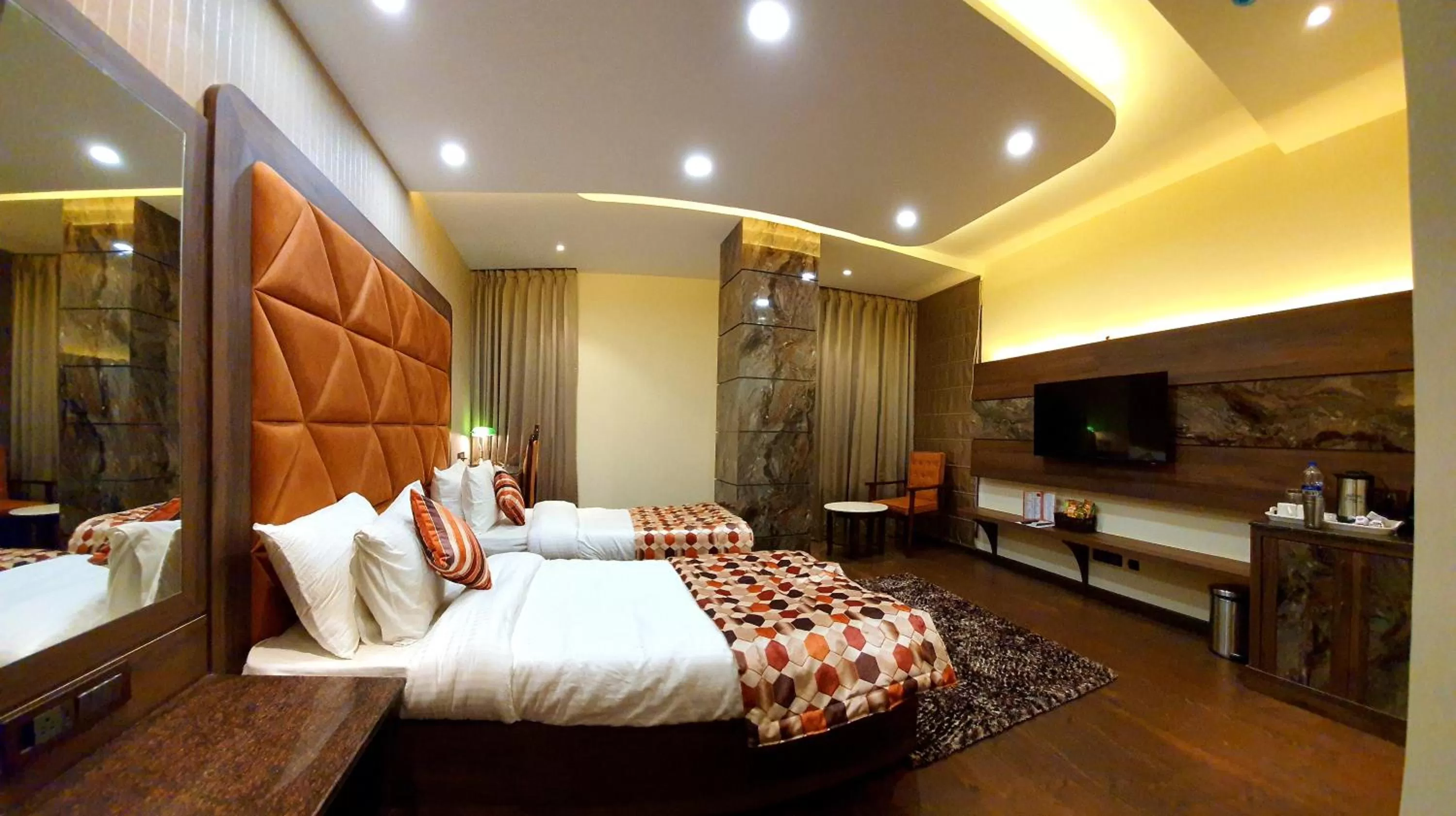 Bed in Hotel Makhan Residency