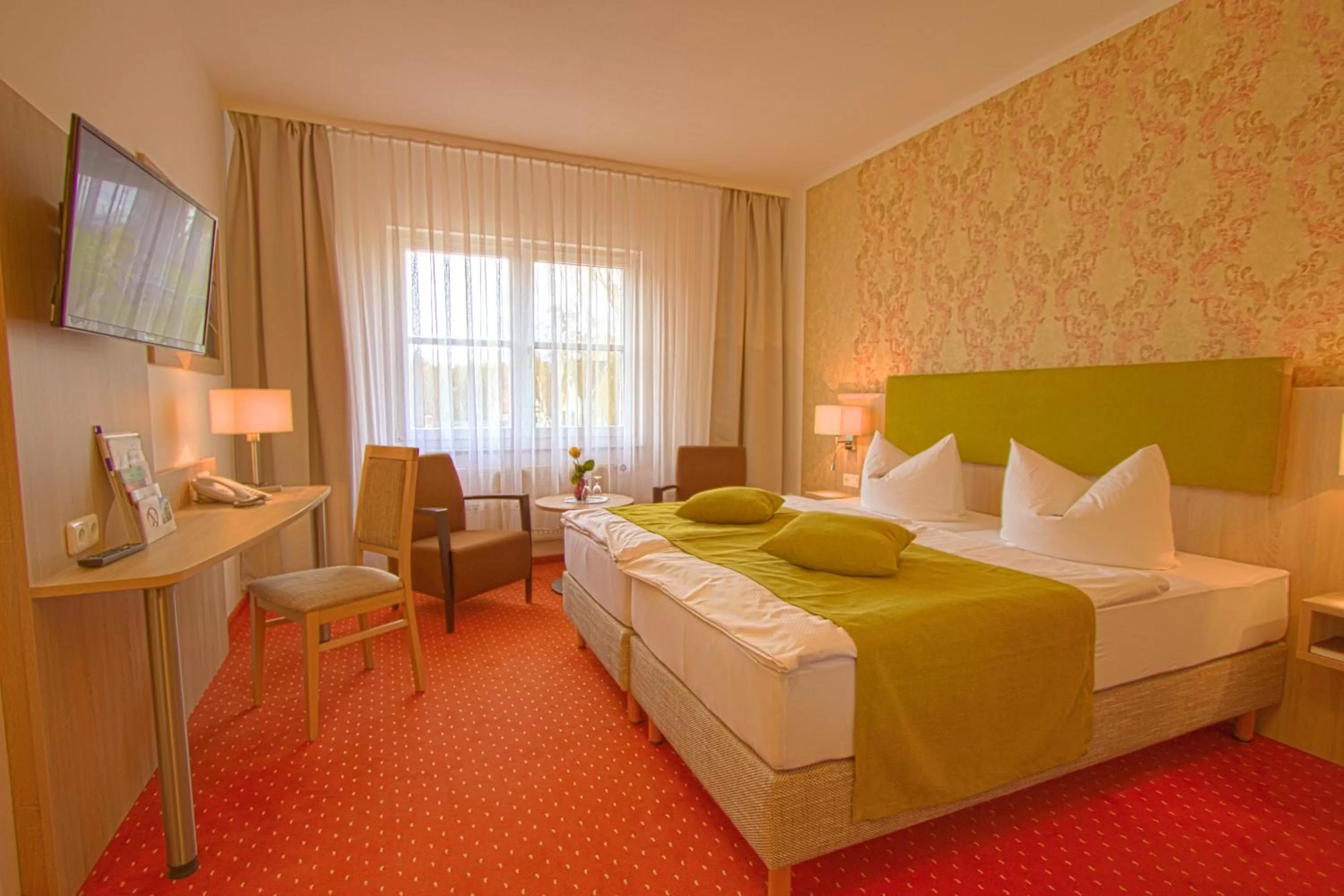Photo of the whole room, Bed in Falk Seehotel Plau am See