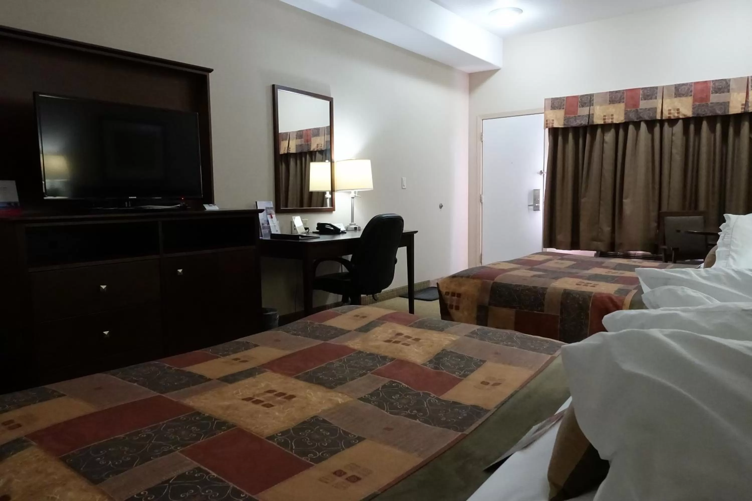 Bed in Ramada by Wyndham Weyburn