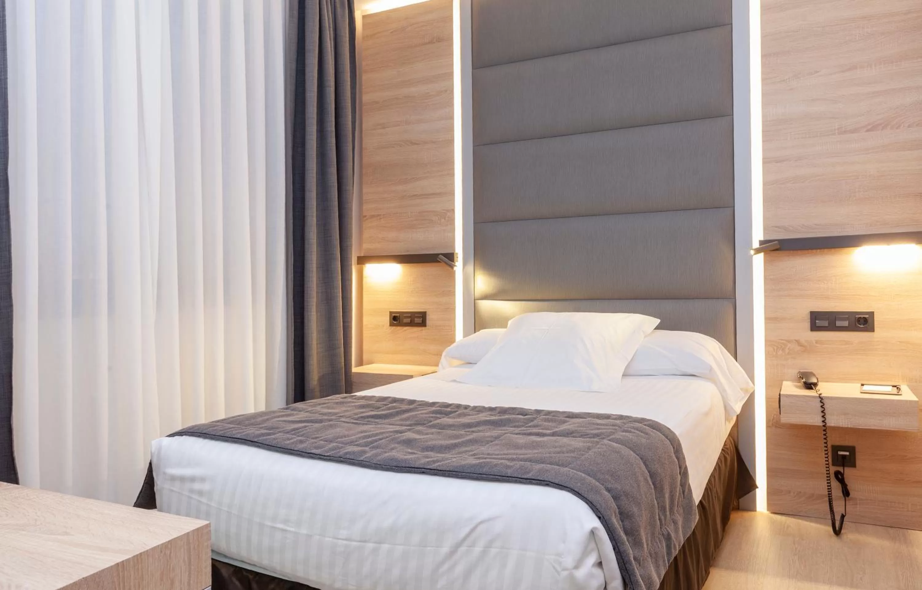 Bed in Hotel Liabeny