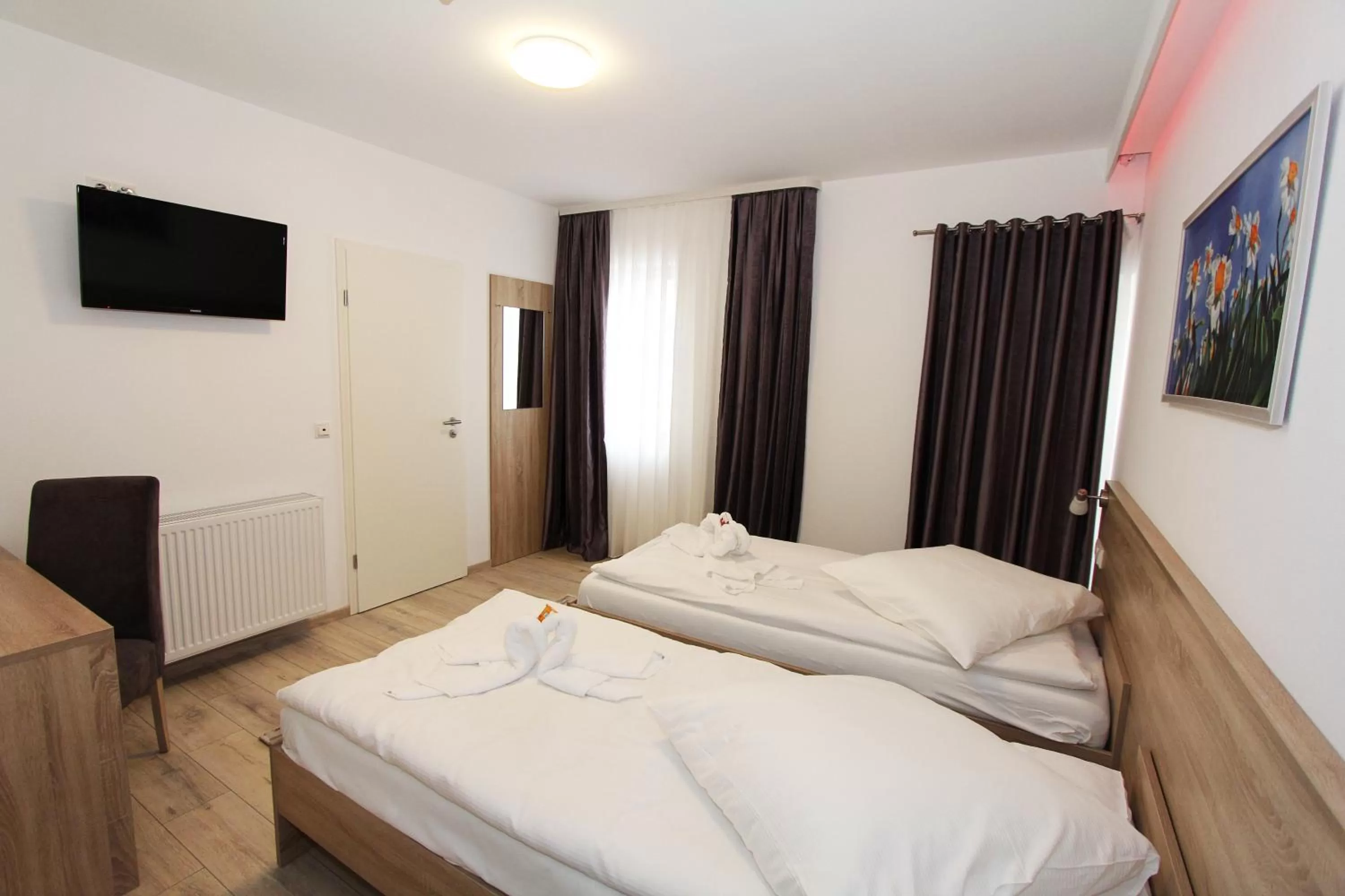 Photo of the whole room, Bed in Pension Villa Colosseo im Herzen von Meiningen