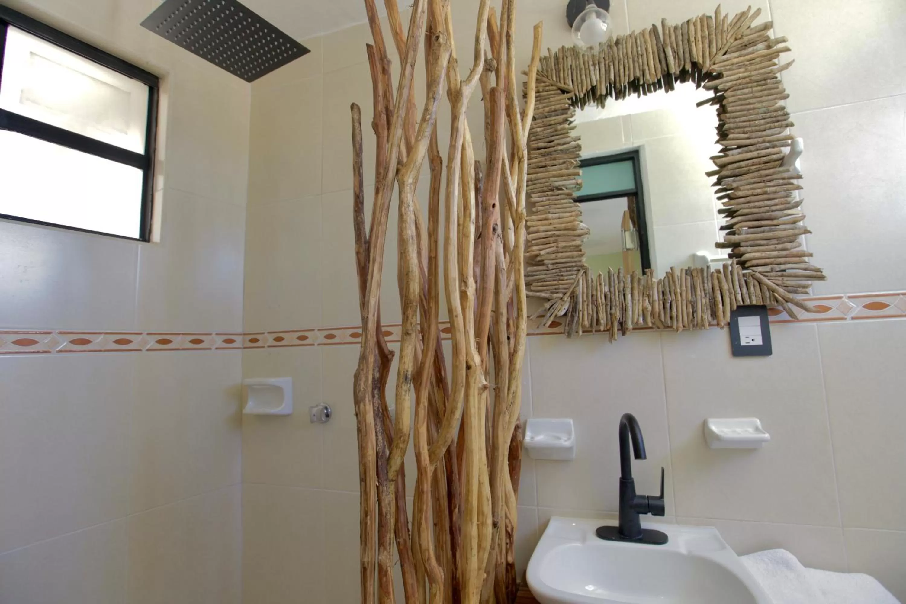 Bathroom in LA TULUMEÑA Boutique Hotel