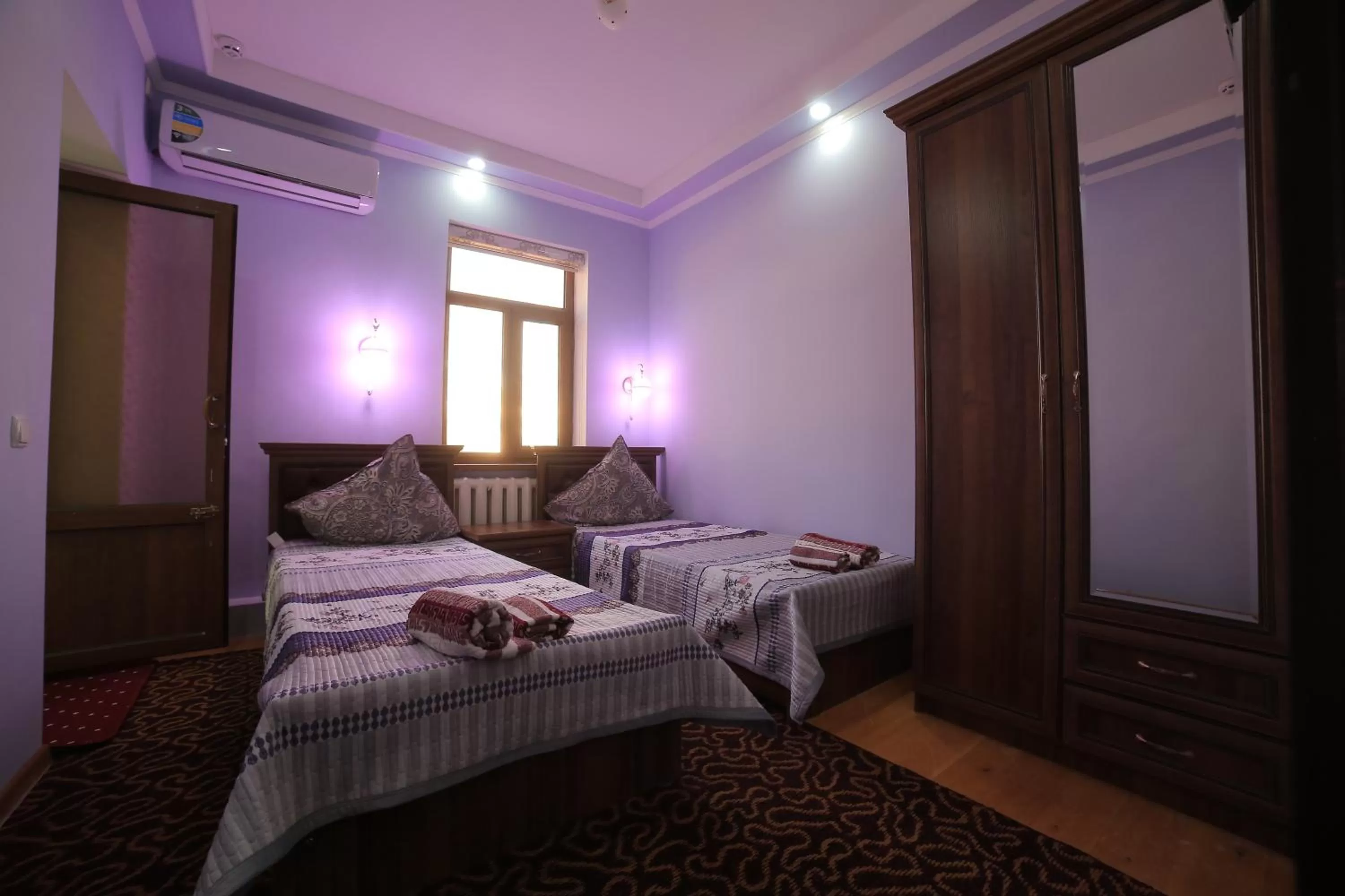 Photo of the whole room, Bed in Alliance hotel bukhara