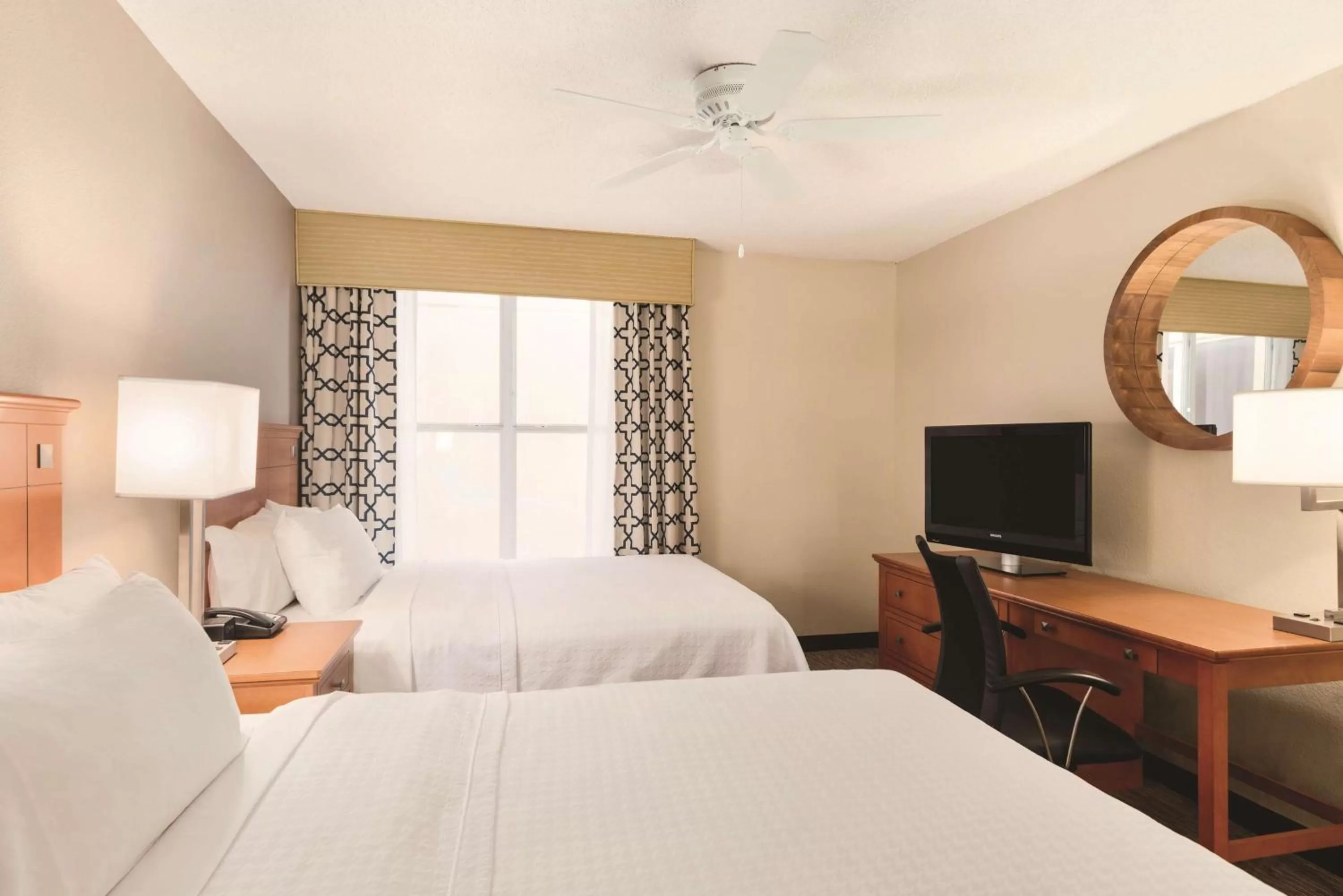 Bed in Homewood Suites by Hilton Orlando-International Drive Convention Center