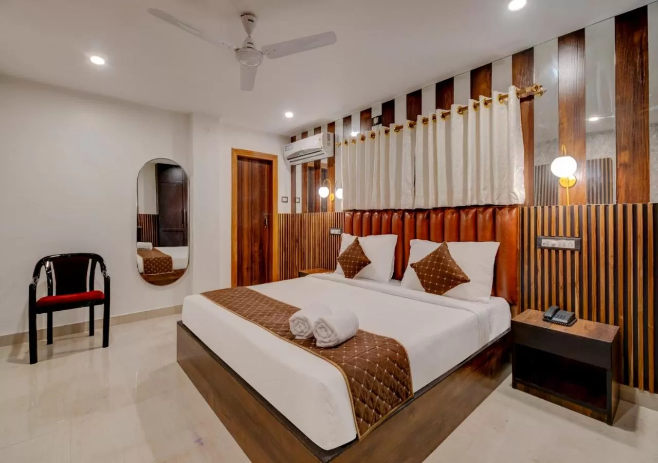 Photo of the whole room, Bed in Hotel Sai Rain Tree