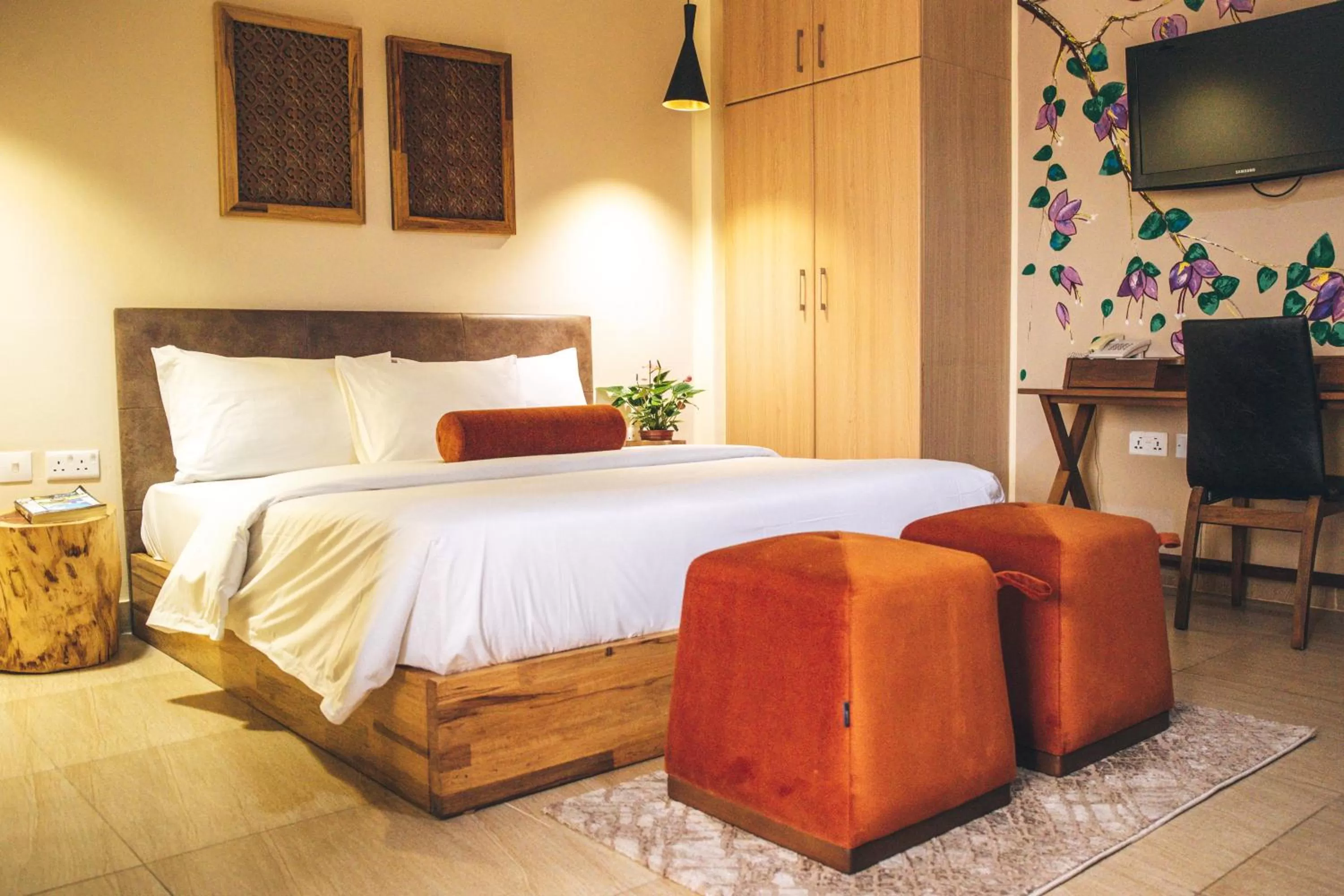 Bed in Roots Hotel Apartment