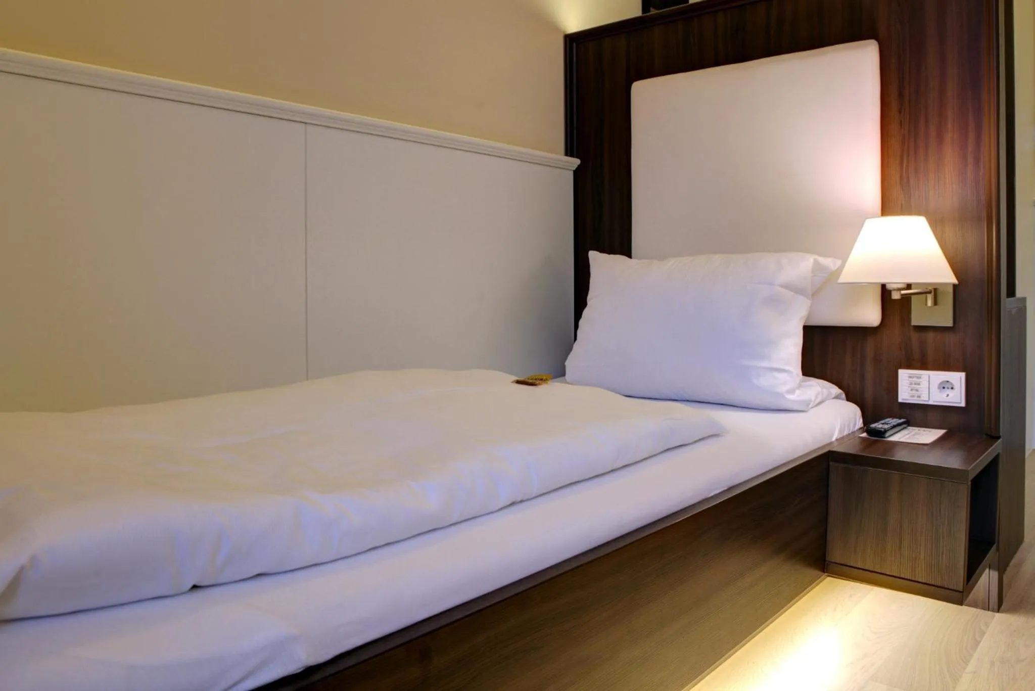 Bed in The Heidelberg Exzellenz Hotel