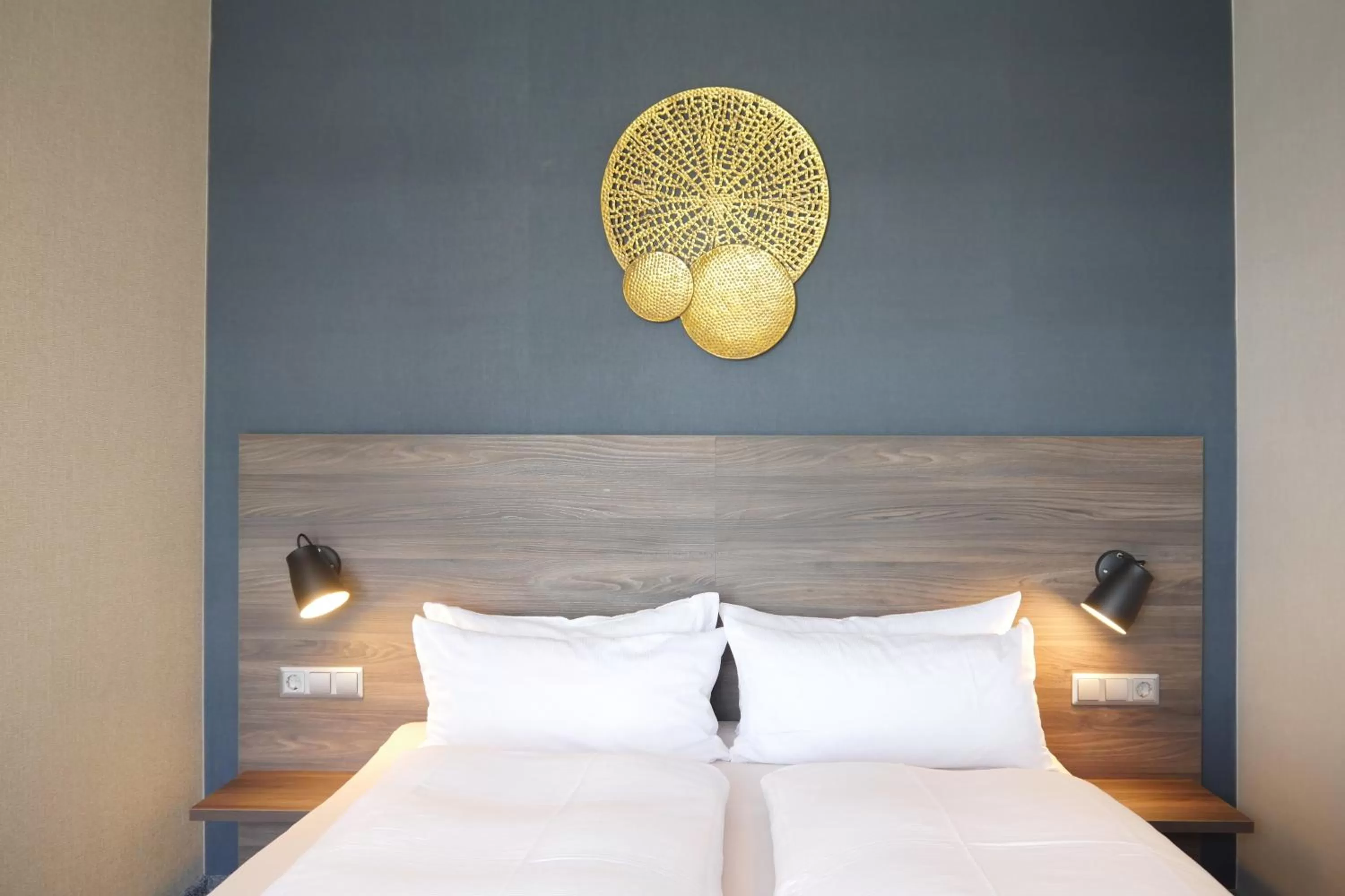 Bed in NaturKulturHotel Stumpf