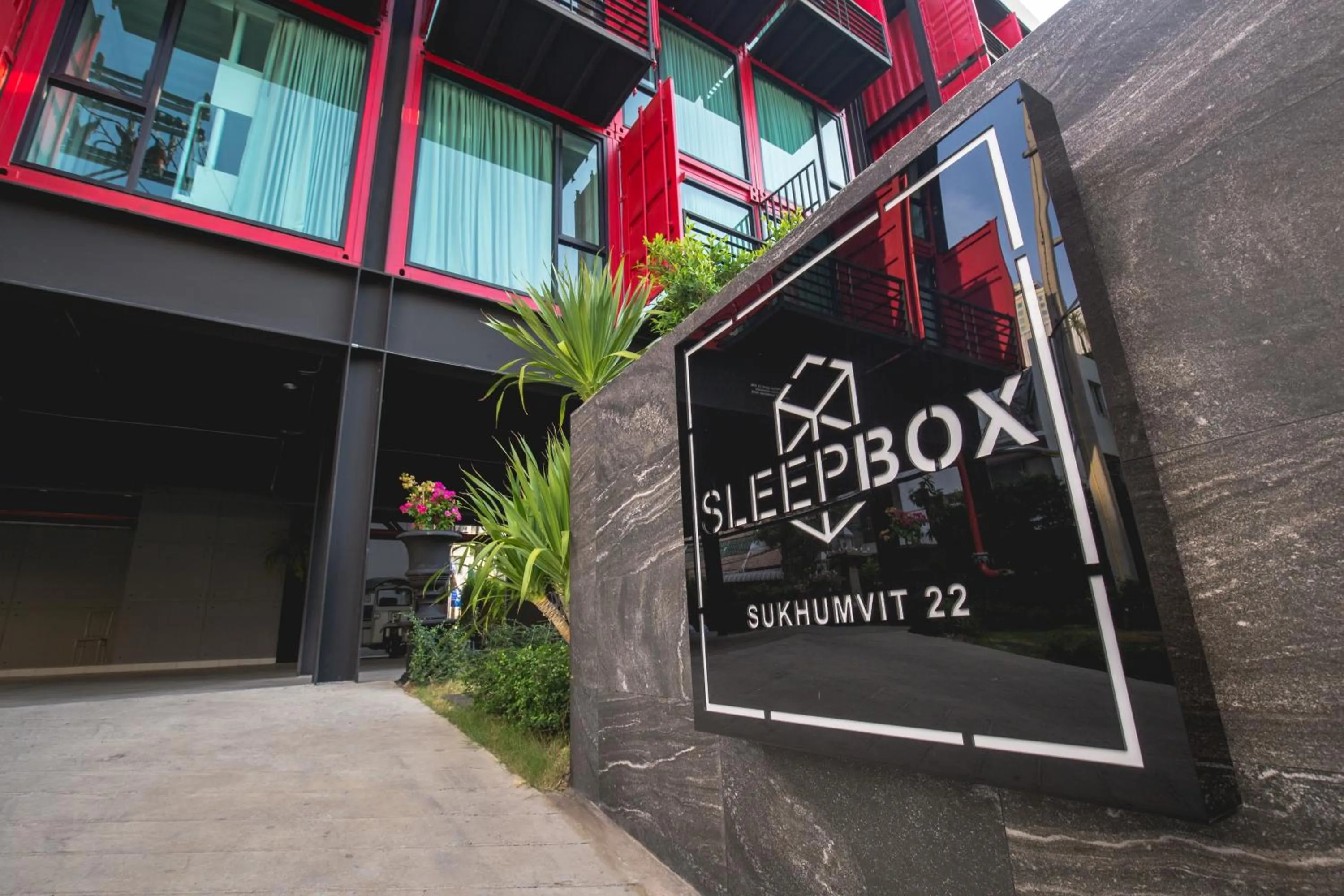 Property logo or sign in Sleep Box Hotel Sukhumvit 22