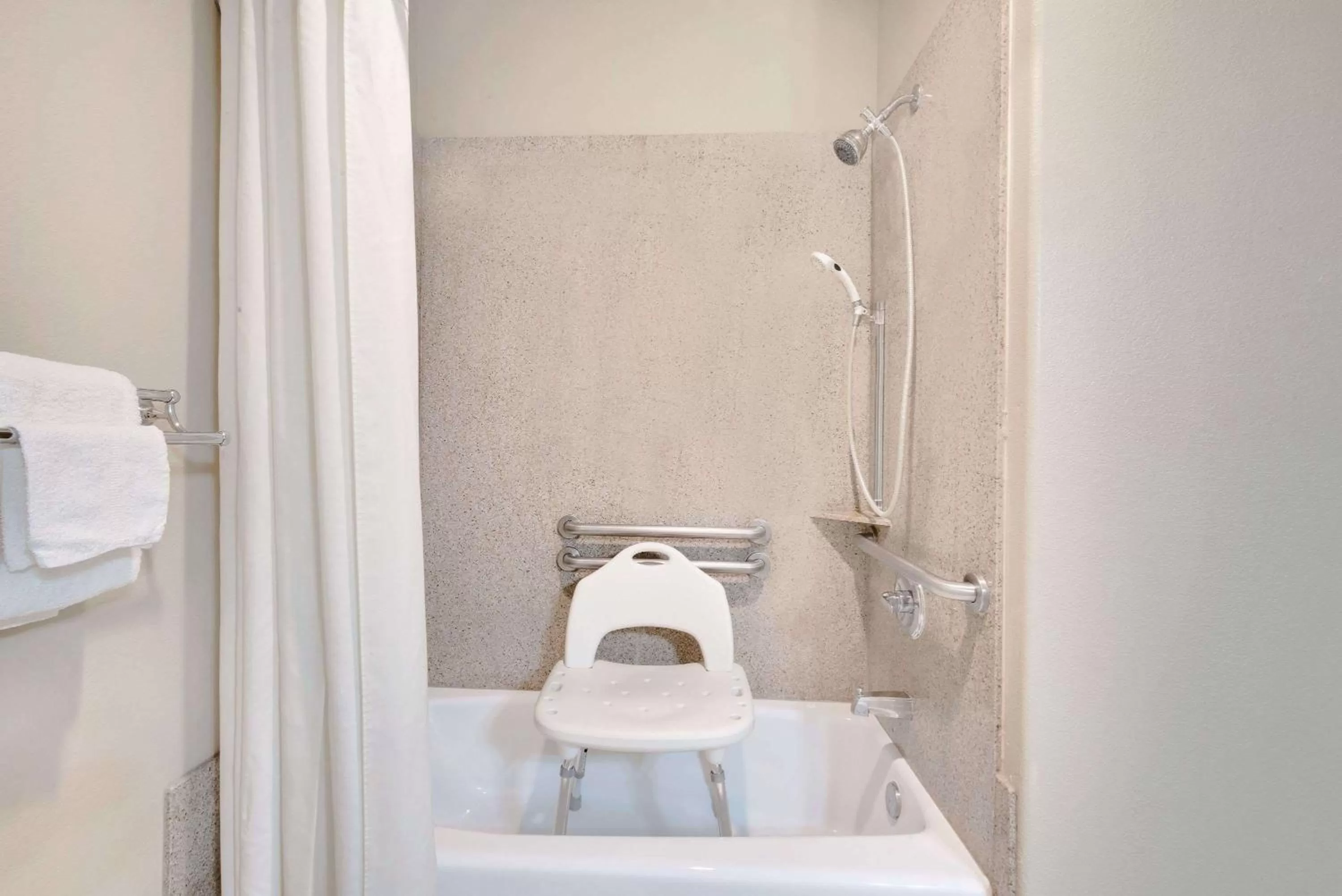 Bathroom in Super 8 by Wyndham Odessa TX