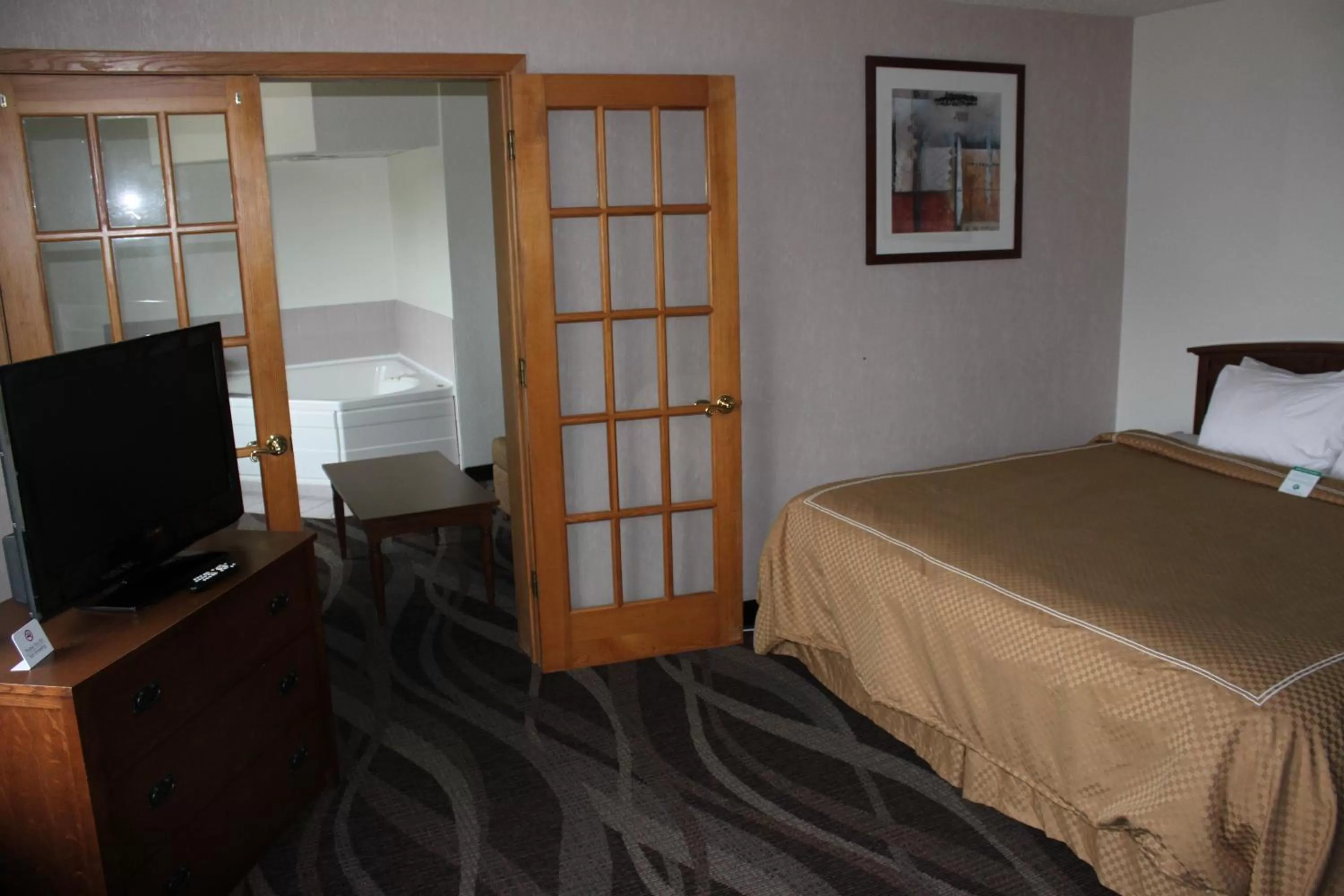 Bed in Boarders Inn and Suites by Cobblestone Hotels - Ripon