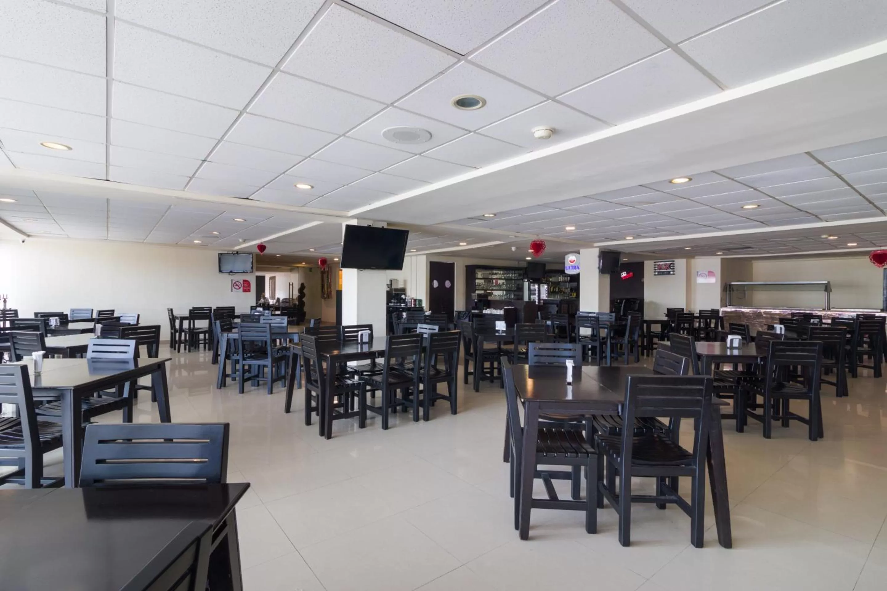 Restaurant/Places to Eat in Capital O Hotel Herederos, Piedras Negras