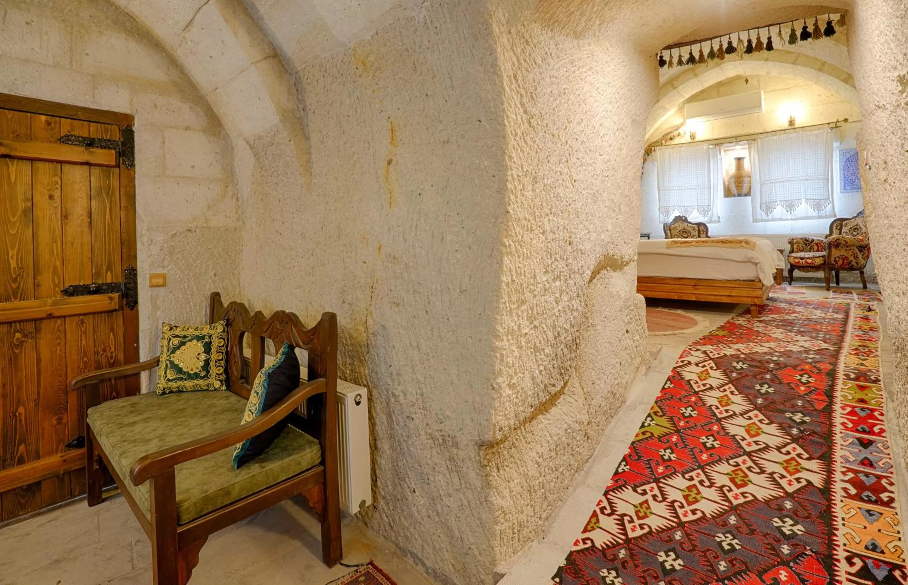 Bed in Tulip Cave Suites