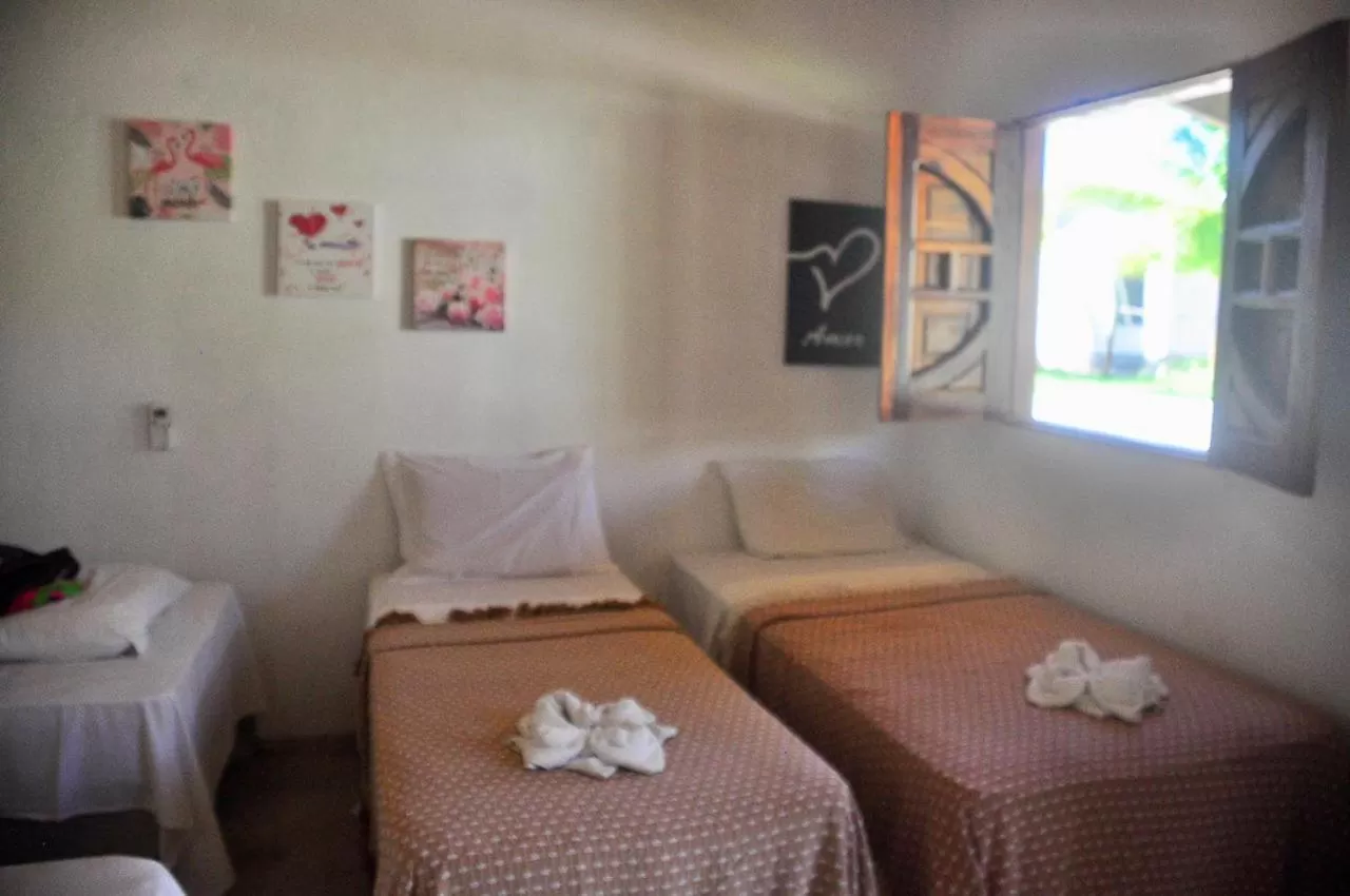 Bed in Pousada e Restaurante Encanto das Águas