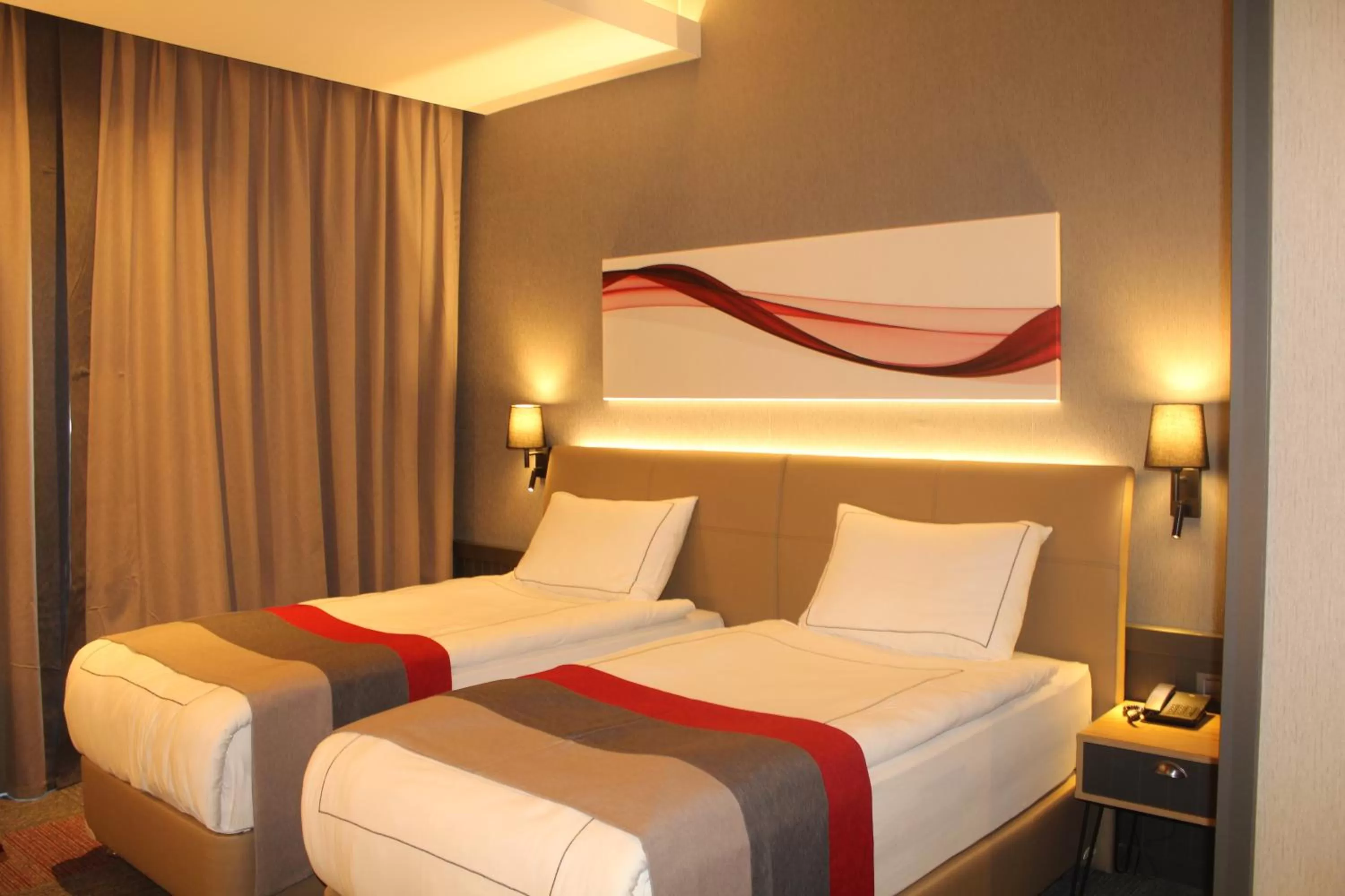 Bedroom, Bed in Ramada By Wyndham Tire